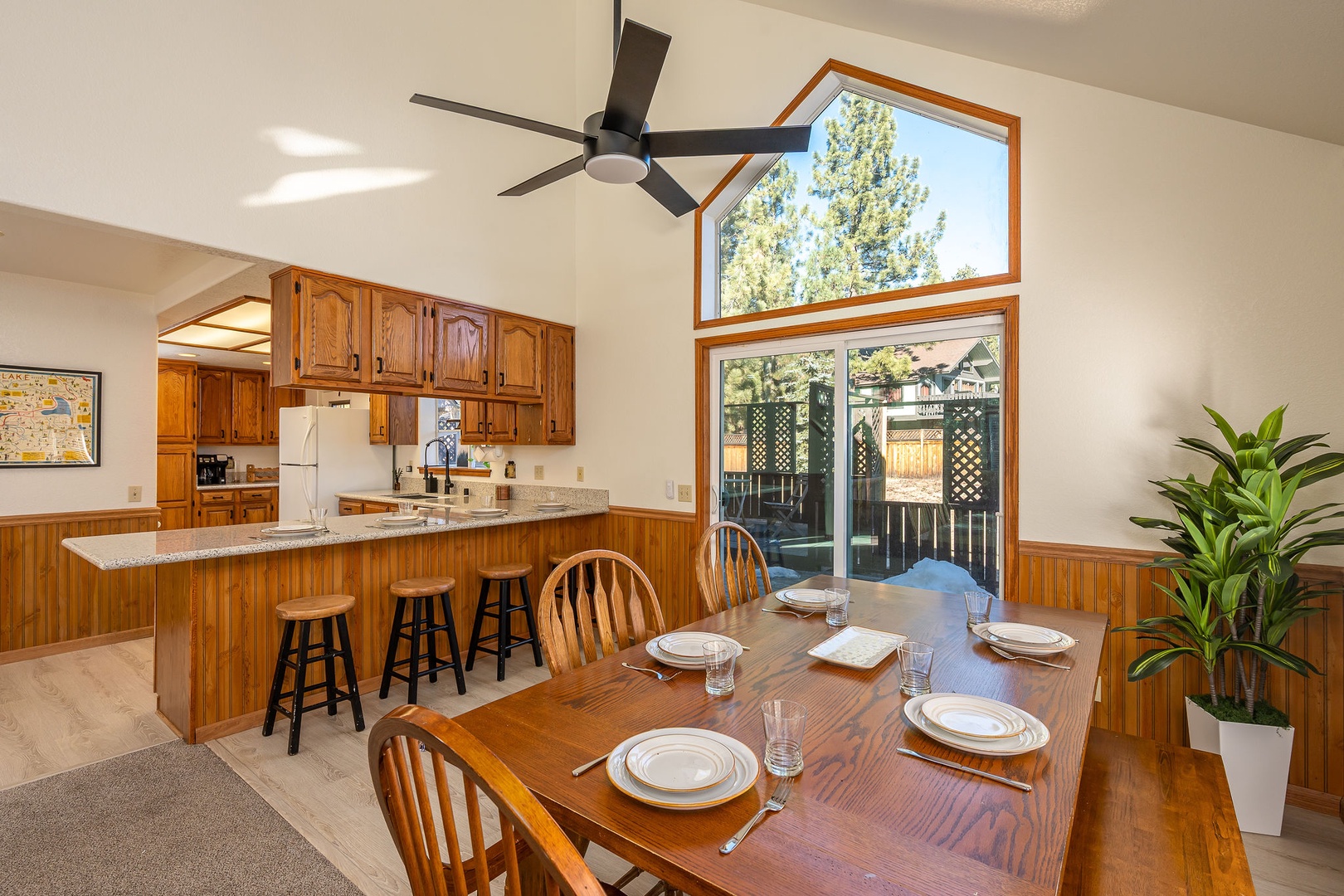 Gather around the spacious dining table together, after cooking in the fully equipped kitchen.