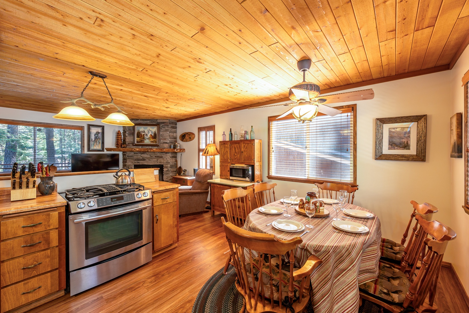 Your cozy cabin kitchen welcomes you with warm wood details and rustic charm for memorable meals together.