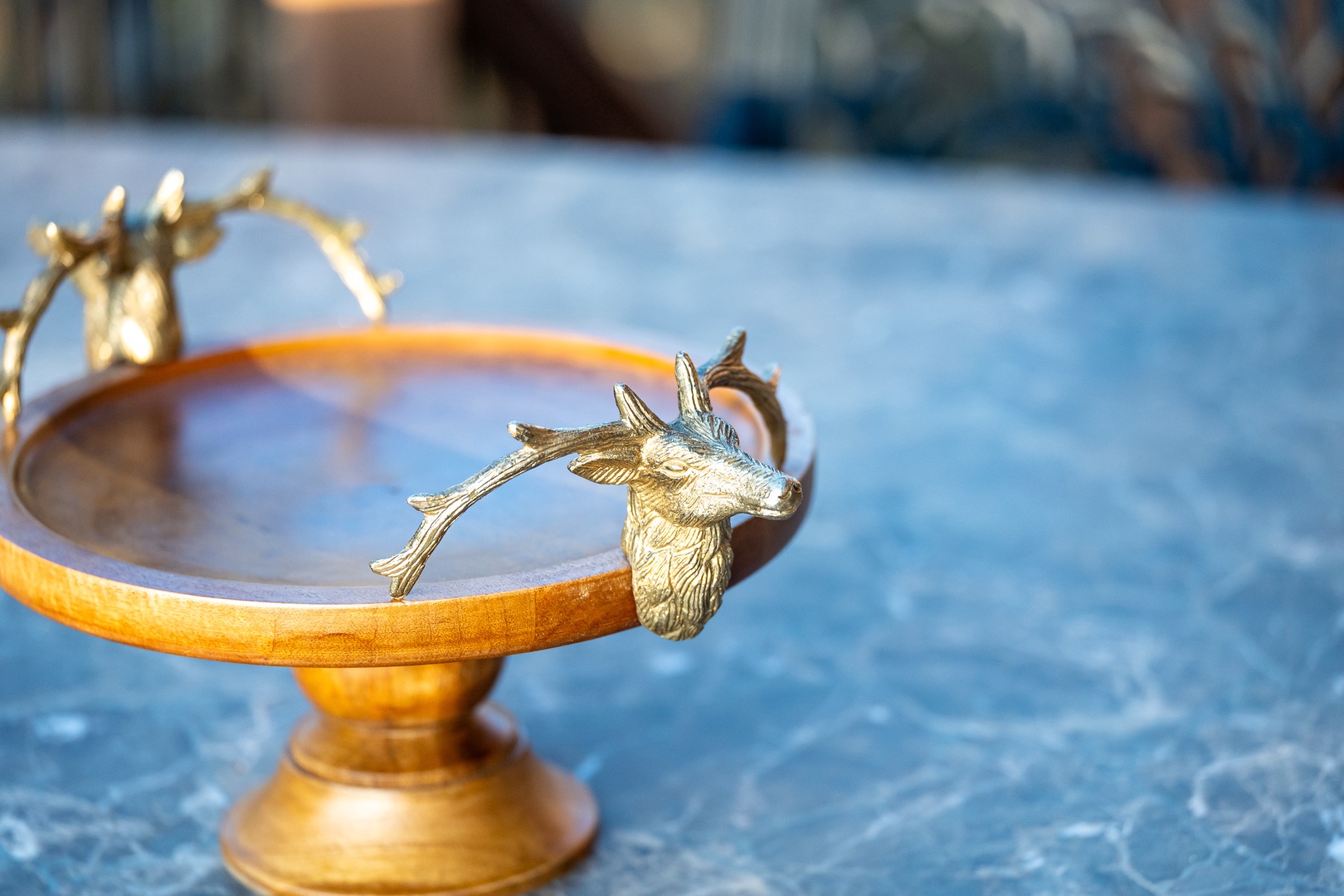 Elegant decorative details add charm to your poolside experience, with sparkling blue waters creating the perfect backdrop for relaxation.