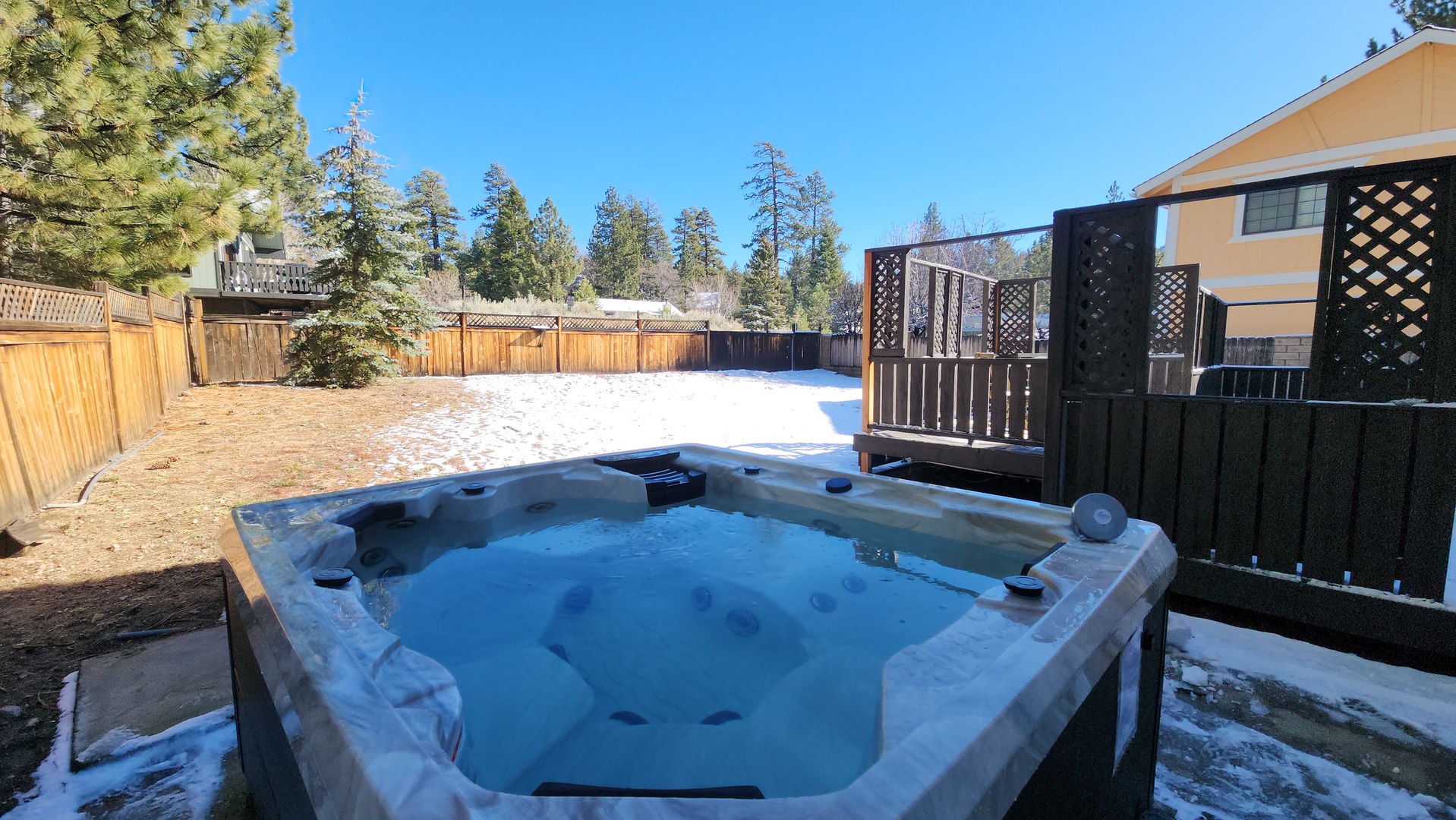 Stay warm in the hot tub with spectacular sky views