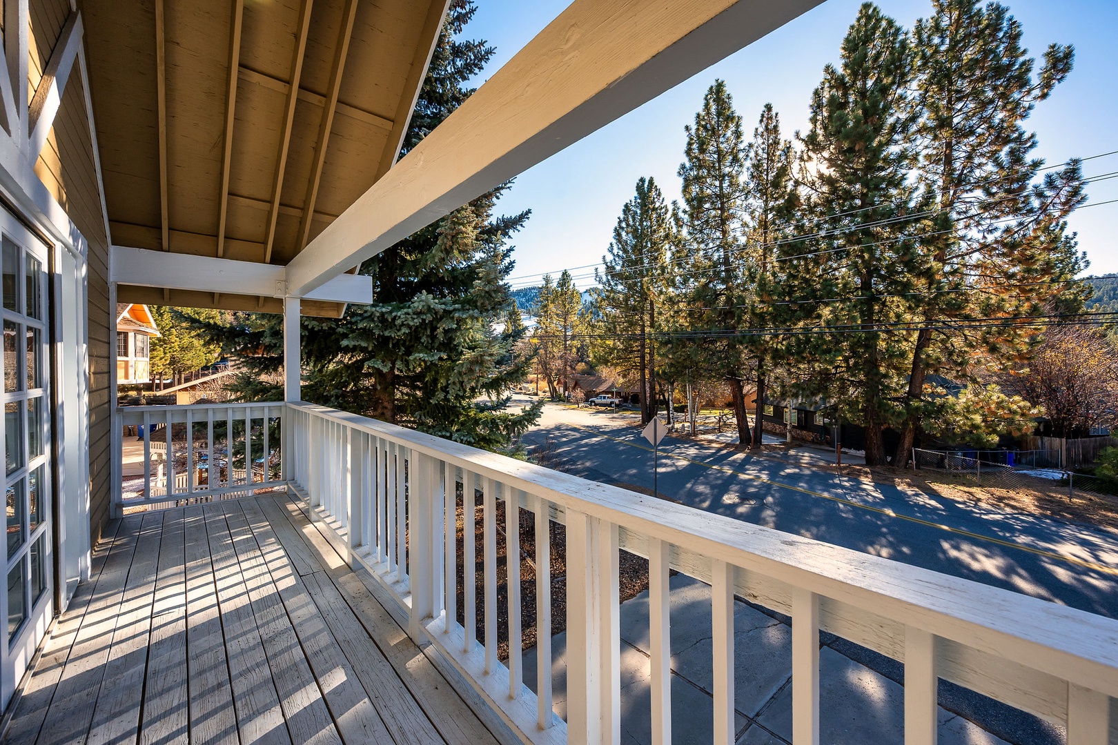Step onto your private balcony and breathe in the fresh mountain air while taking in peaceful neighborhood views through towering evergreens.