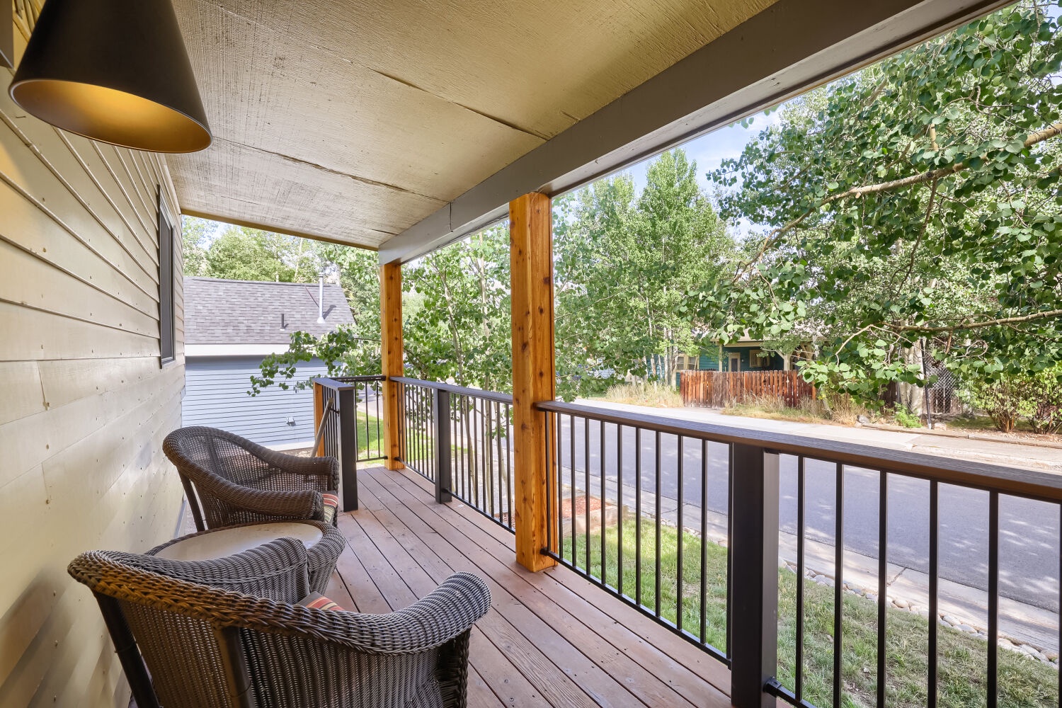Unwind in your private covered balcony, where leafy views and comfortable seating invite you to sip morning coffee or enjoy peaceful evenings.