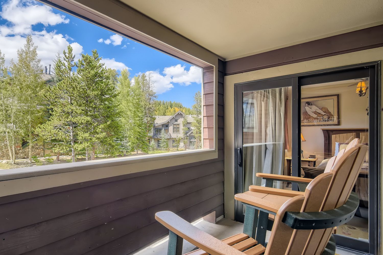 Relax in your private balcony chairs while taking in peaceful forest views and mountain scenery.