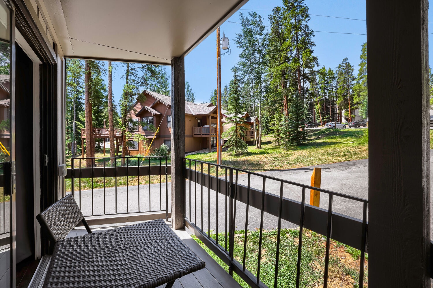 Step out onto your private balcony and breathe in the fresh pine-scented air, surrounded by towering evergreens and peaceful mountain views.
