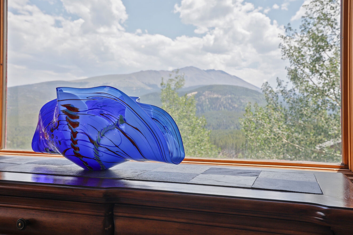 Breathtaking mountain vistas frame your stay, where natural beauty meets refined comfort and every window reveals the majesty of the surrounding peaks.
