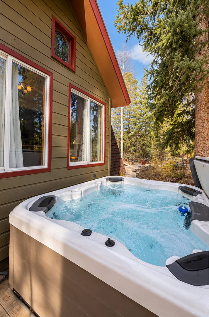 Slip into your private hot tub and let the warm, bubbling water melt away tension as you soak in the peaceful woodland surroundings and fresh mountain air.