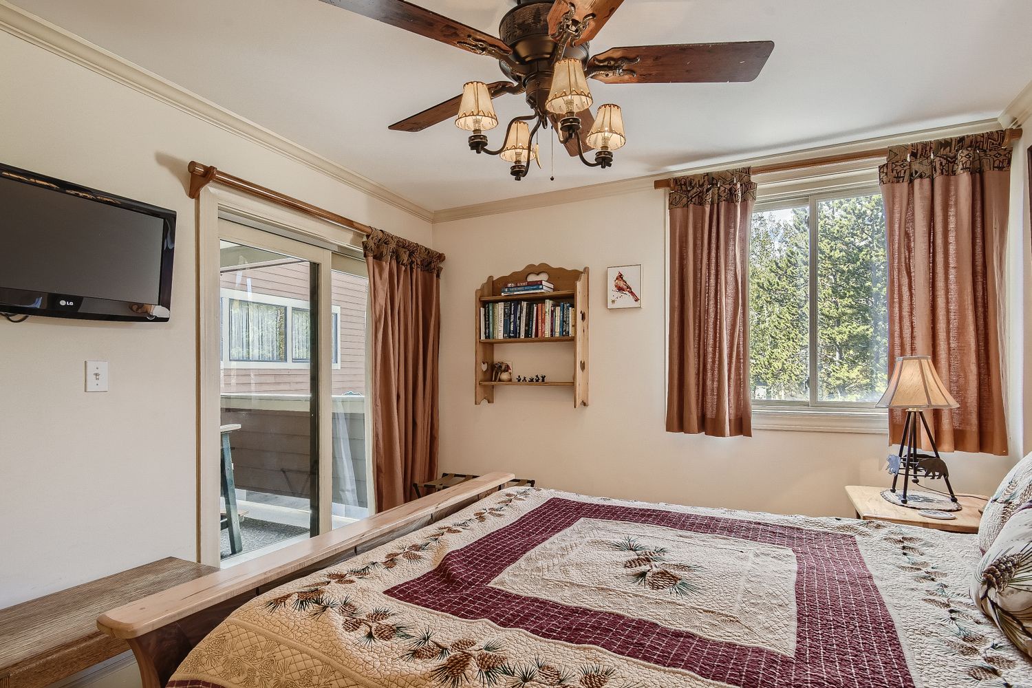 Relax in your cozy bedroom featuring rustic charm with handcrafted details, warm wood accents, and peaceful views.