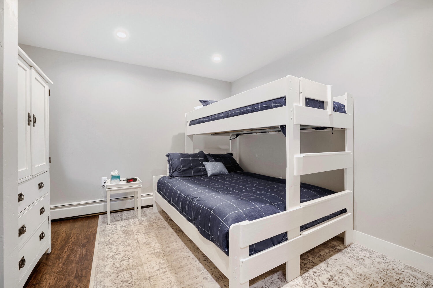 This cozy bunk room offers comfortable sleeping quarters for your group, with crisp linens and ample storage space to keep your belongings organized.