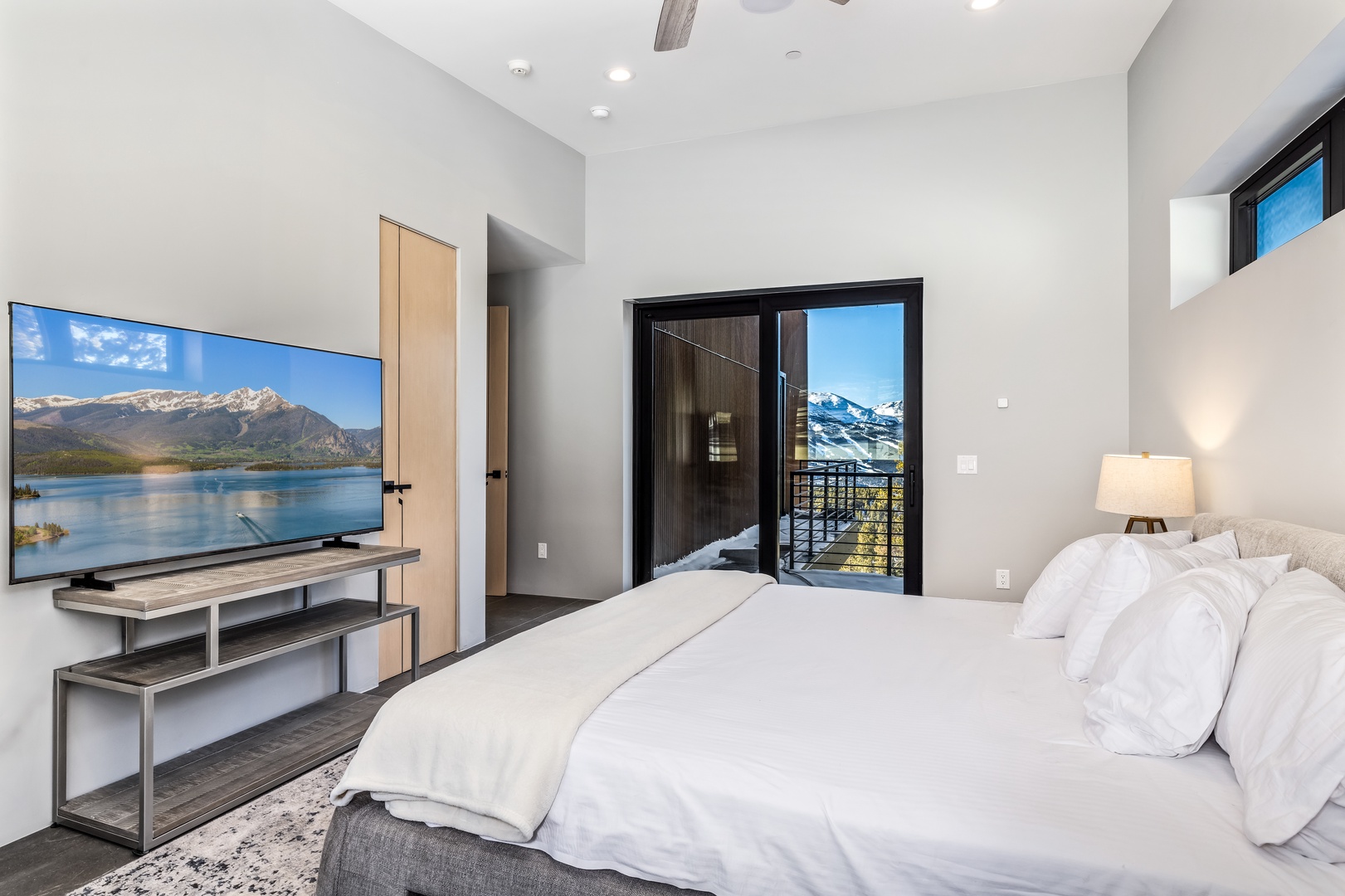 Wake up to stunning mountain vistas from your private balcony and unwind with your favorite shows on the large TV.