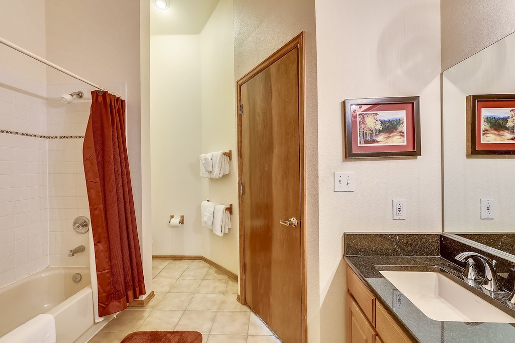 Your spacious bathroom features a relaxing tub-shower combo and granite vanity, creating your perfect morning routine retreat.
