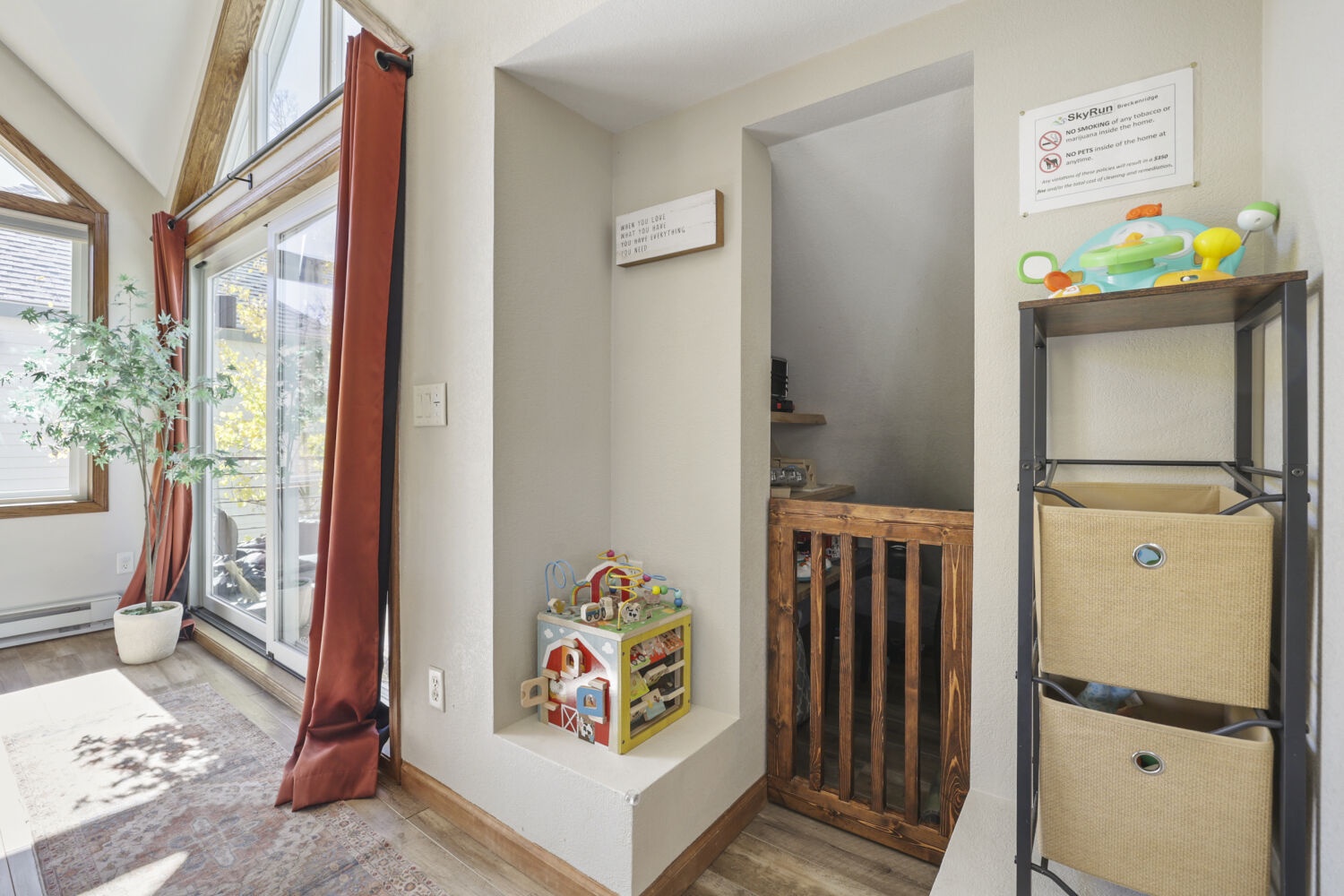 Bright and welcoming space with plenty of natural light for your family. Storage keeps everything organized while toys create a playful, homey feel for little ones.