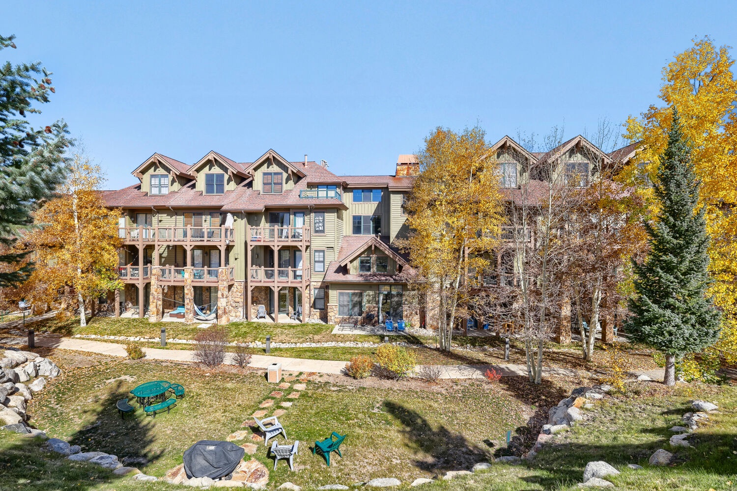 This mountain retreat is nestled among golden aspens and evergreens, offering spacious balconies and a peaceful courtyard setting for your alpine getaway.