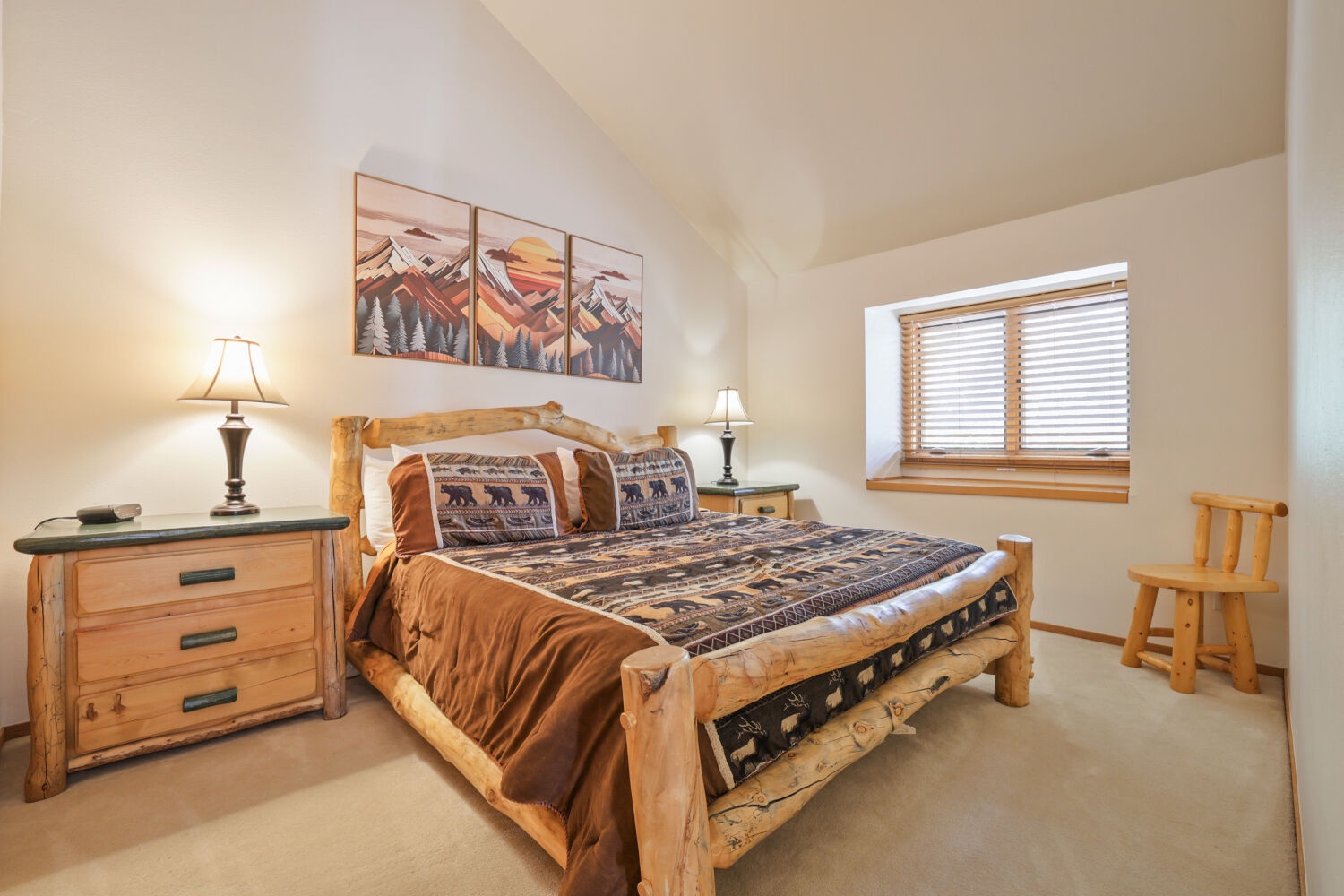 Rustic charm meets cozy comfort in your private retreat. Drift off under soft lighting, wrapped in warm bedding with a mountain-inspired touch, while vaulted ceilings give you room to breathe and unwind.