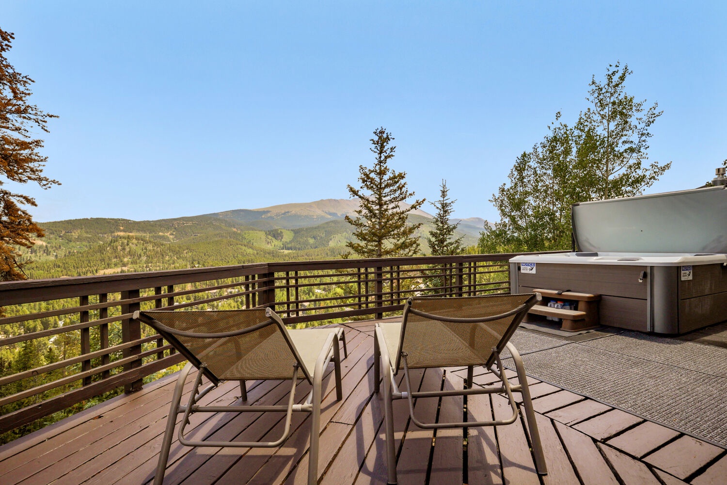 Soak in the hot tub while gazing at breathtaking mountain vistas, or relax in a lounge chair on your private deck surrounded by forested peaks and fresh alpine air.