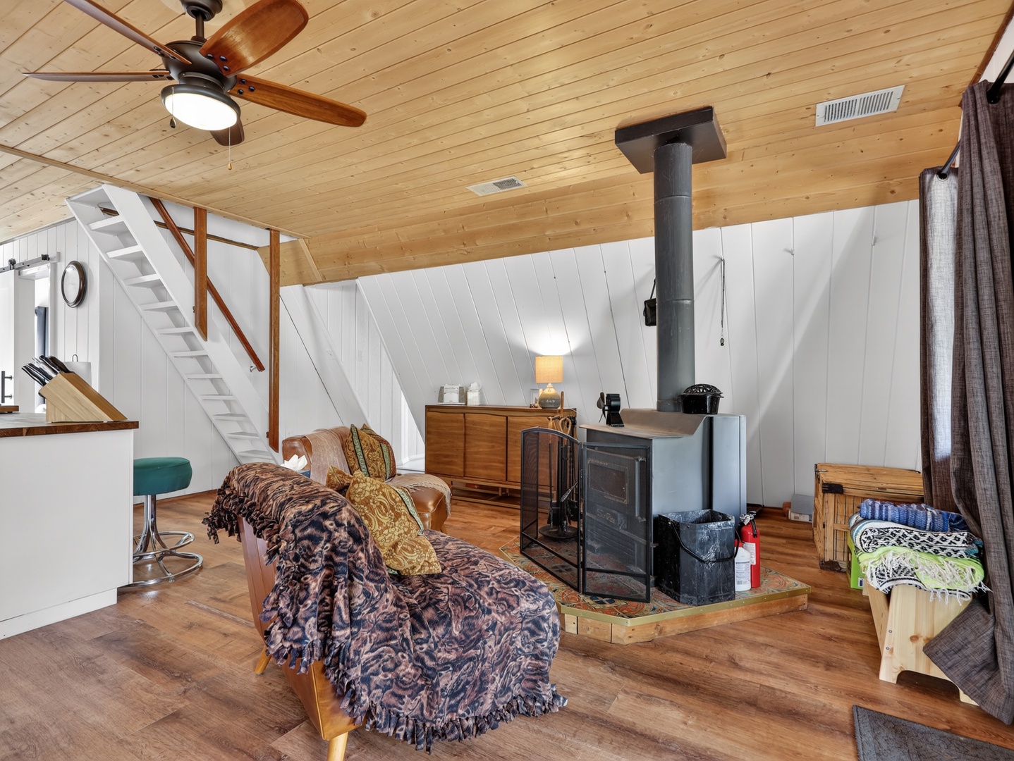 Relax by the wood-burning stove after a day of mountain adventures