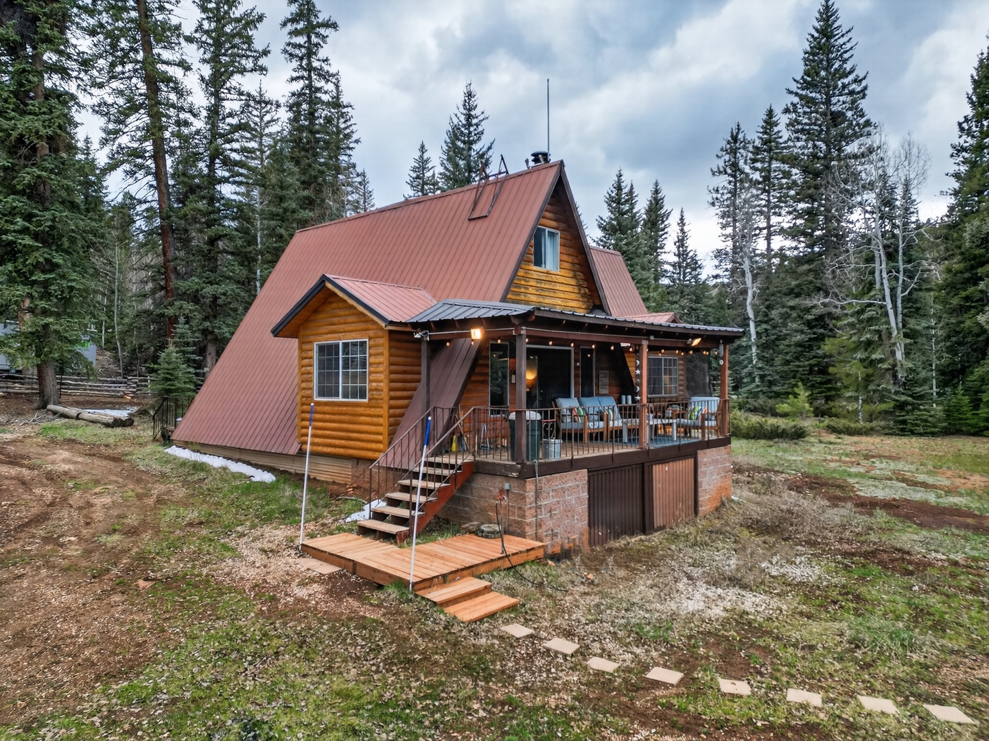 Classic A-frame cabin nestled in the pines—your perfect Duck Creek escape