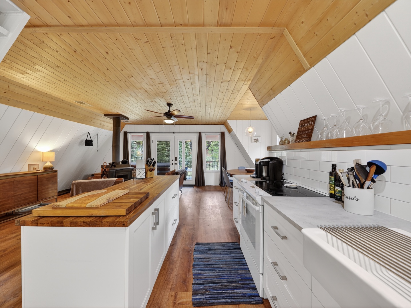 View from the galley kitchen to the open concept living area