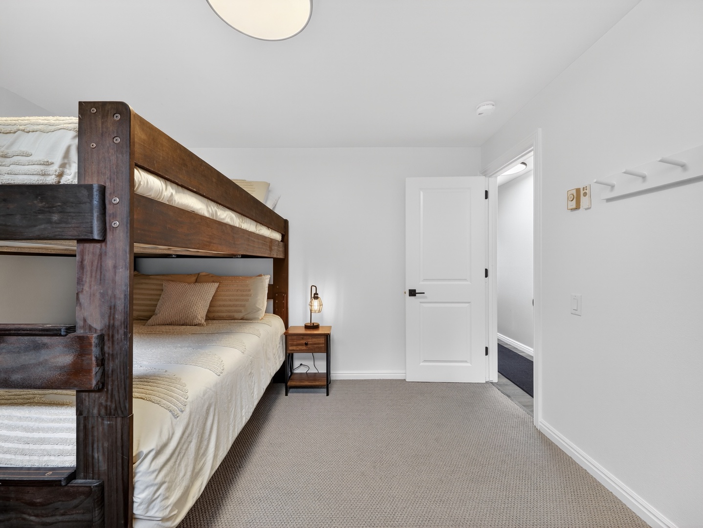 Cozy bunk room in the lower level—great for kids, friends, or group stays