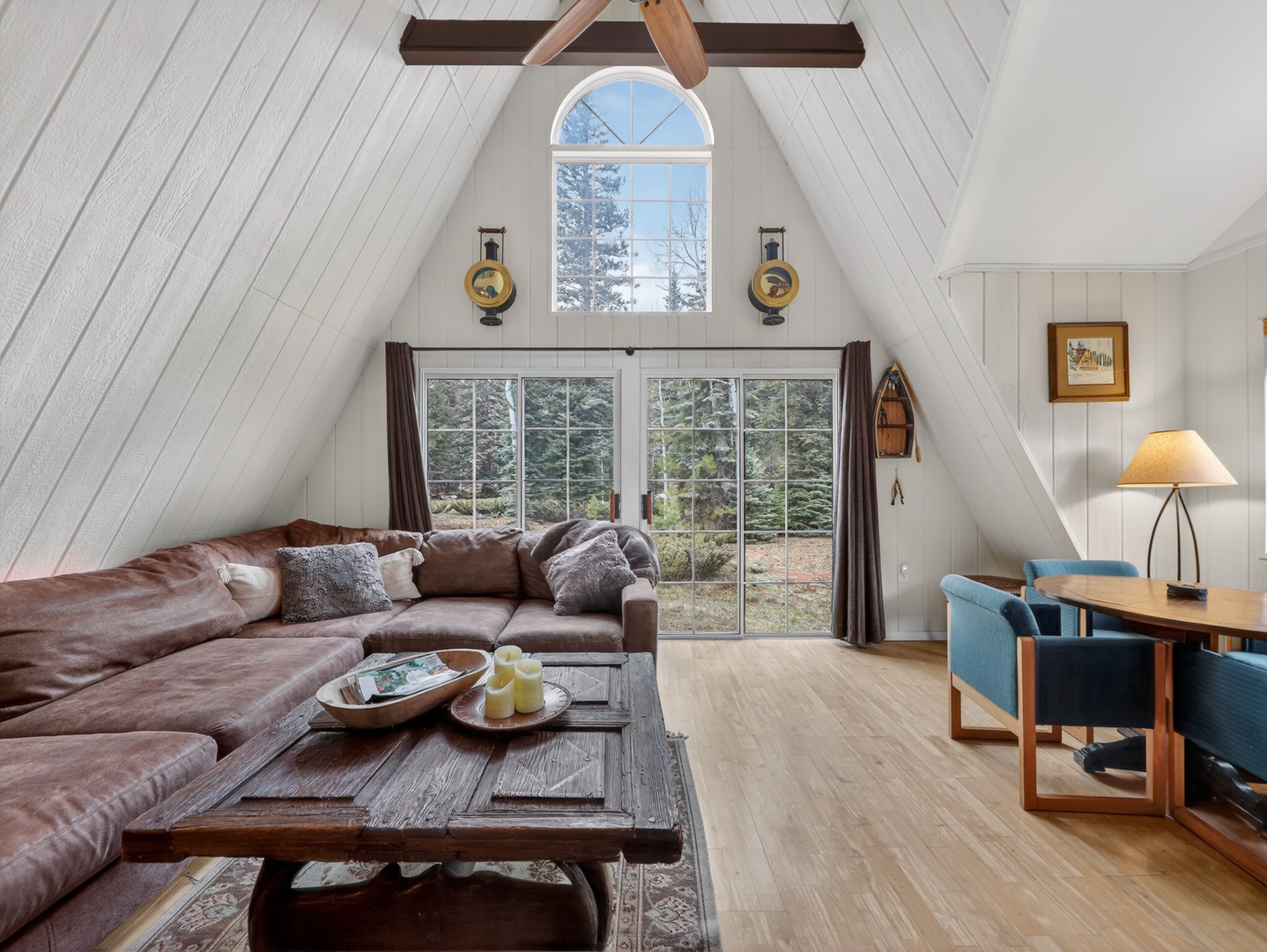 Open living space with soaring ceilings and cozy cabin charm