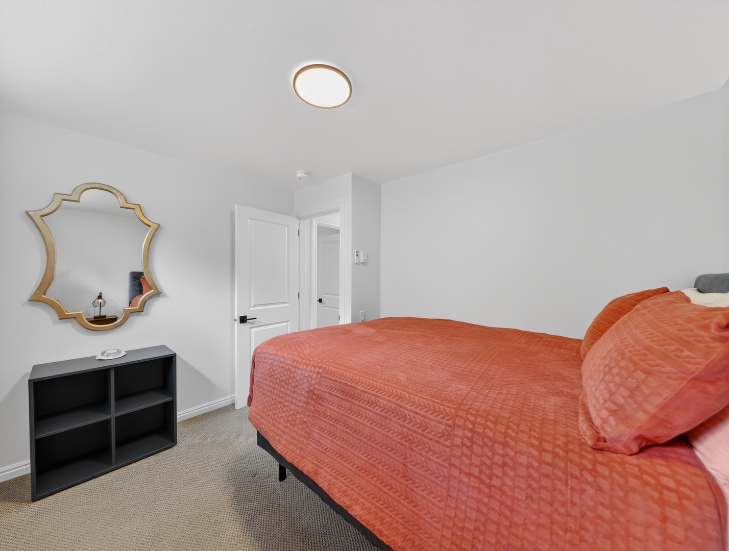 Lower-level bedroom with added privacy
