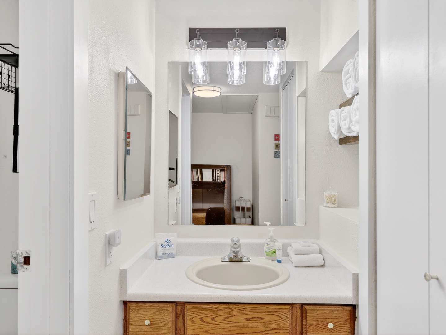 Clean and refreshed bathroom stocked with fresh towels and essentials for your stay