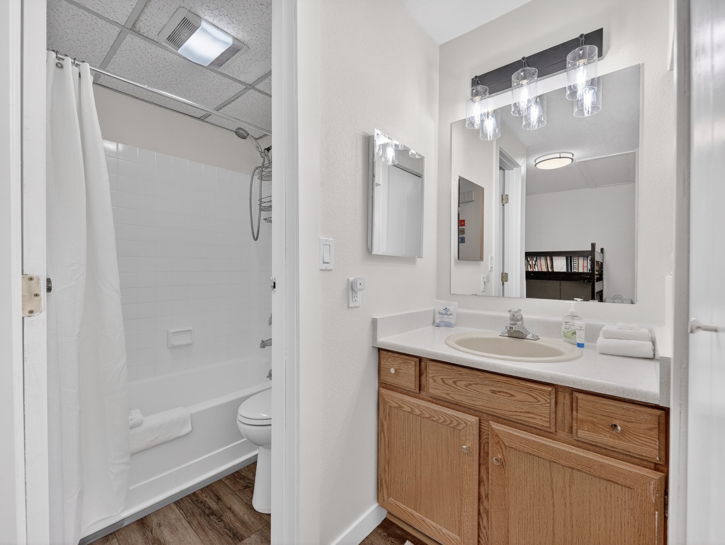 Clean and refreshed bathroom stocked with fresh towels and essentials for your stay