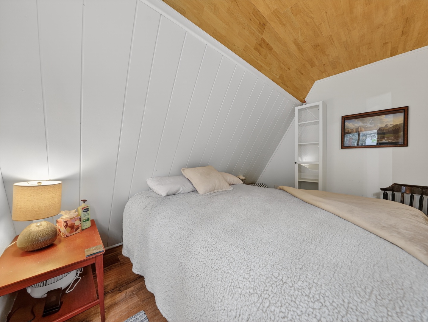 Comfortable primary bedroom designed for restful nights in the mountains