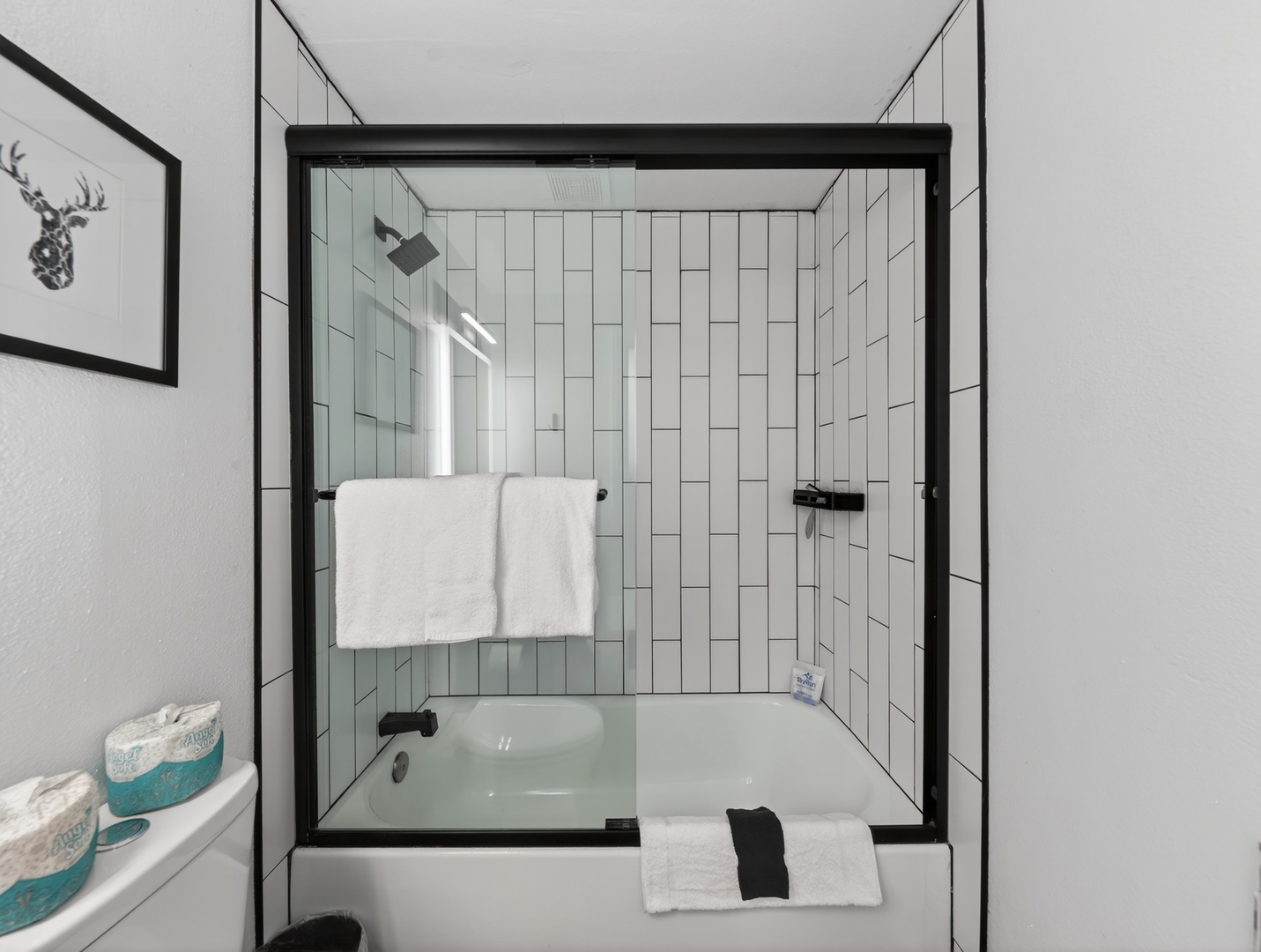 Full bathroom with tub/shower combo—great for families and added convenience
