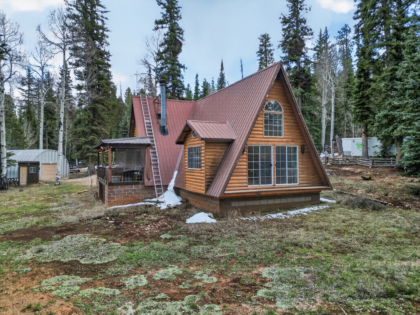 Classic A-frame cabin nestled in the pines—your perfect Duck Creek escape