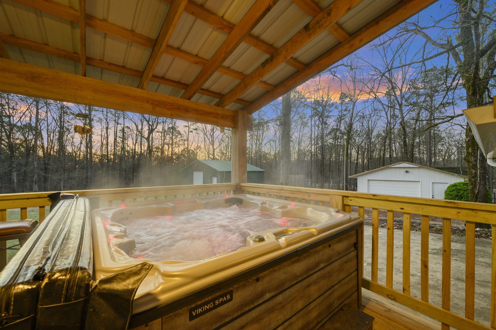Soak under the stars in your private hot tub, surrounded by peaceful woodland views and covered for year-round relaxation.