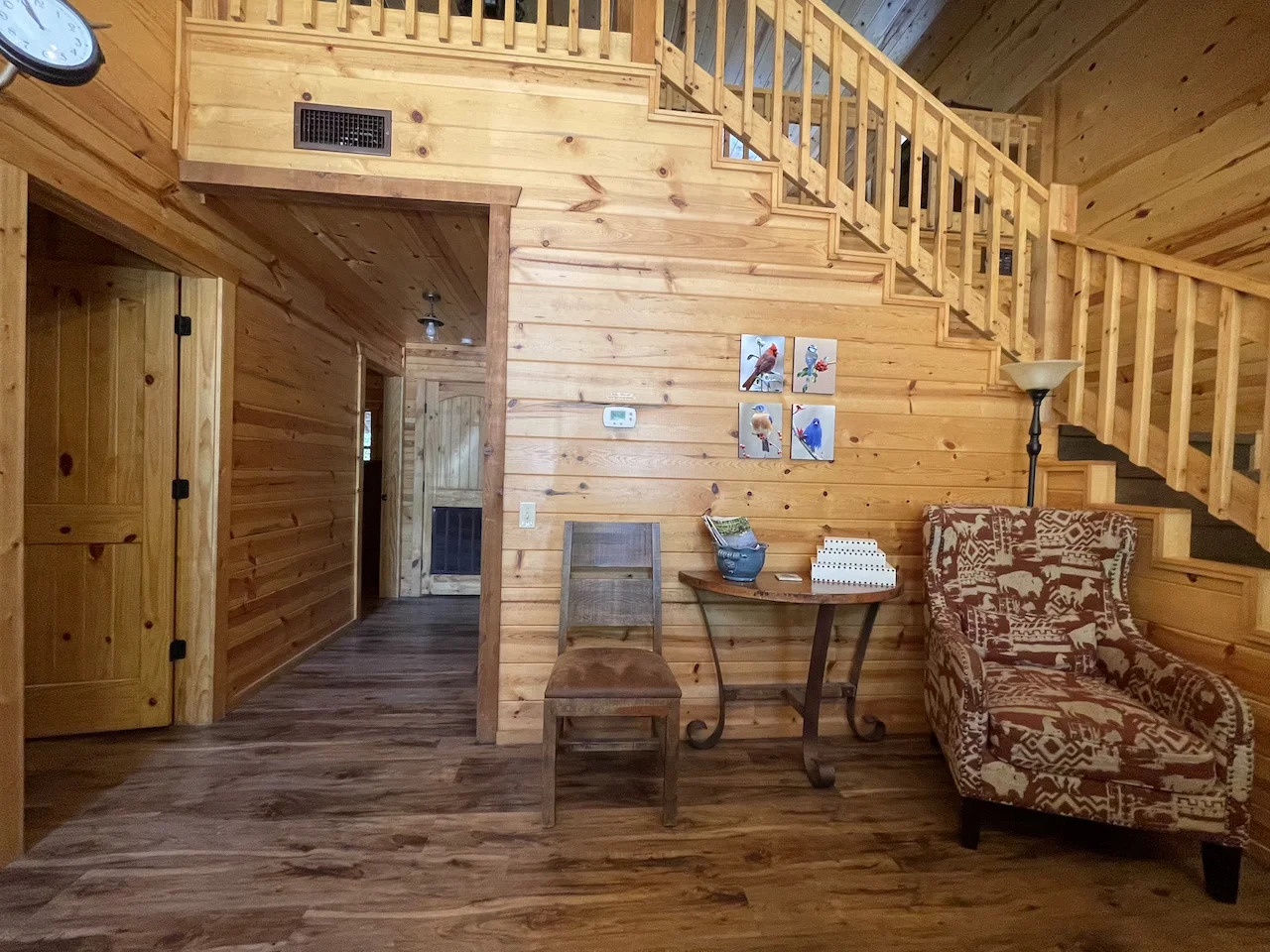 Warm wood walls and rustic charm greet you in this cozy loft-style living space, perfect for unwinding after your mountain adventures.