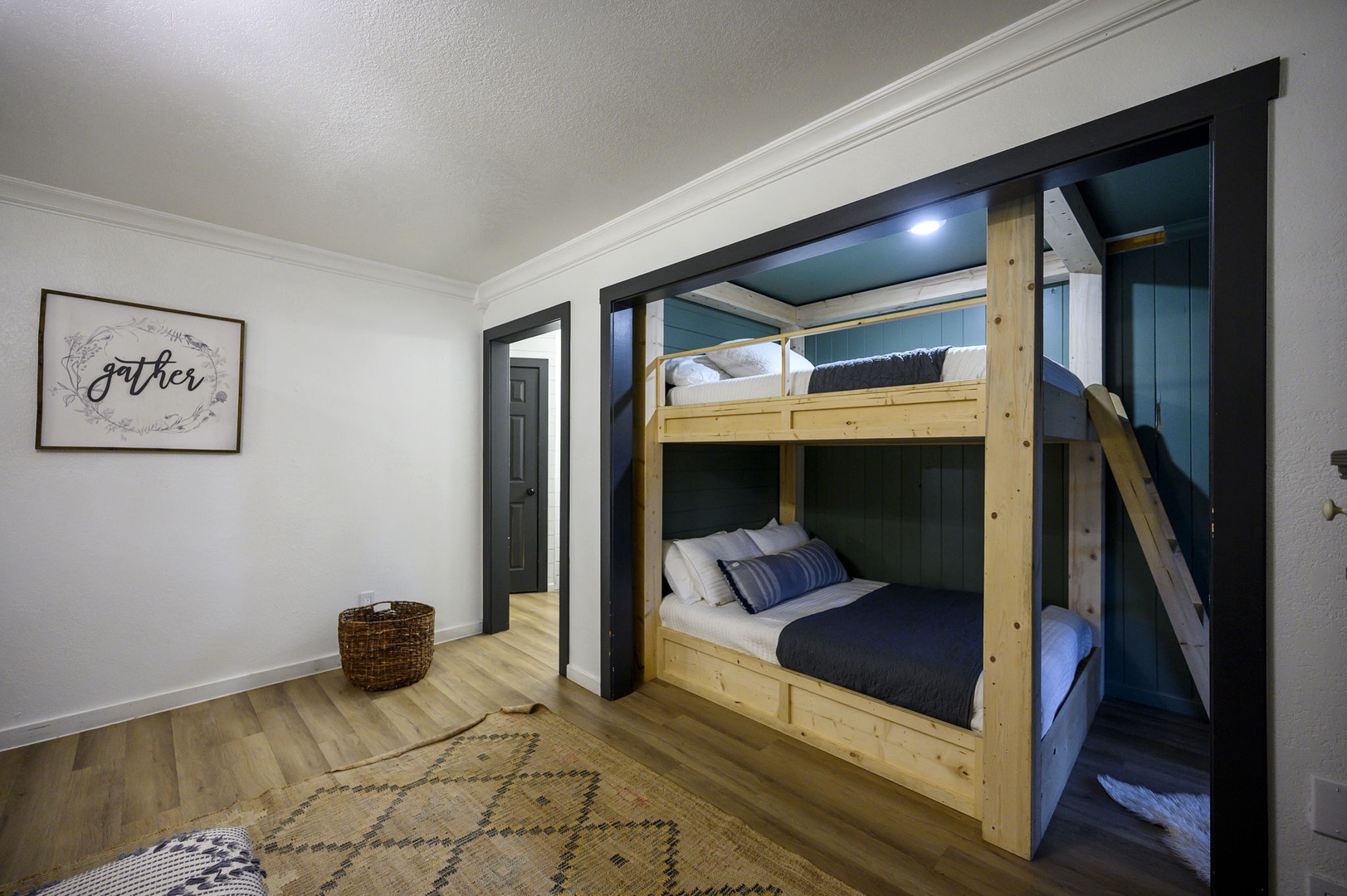 Your cozy bunk room features sturdy wooden beds with comfortable linens, perfect for families or groups sharing adventures together.