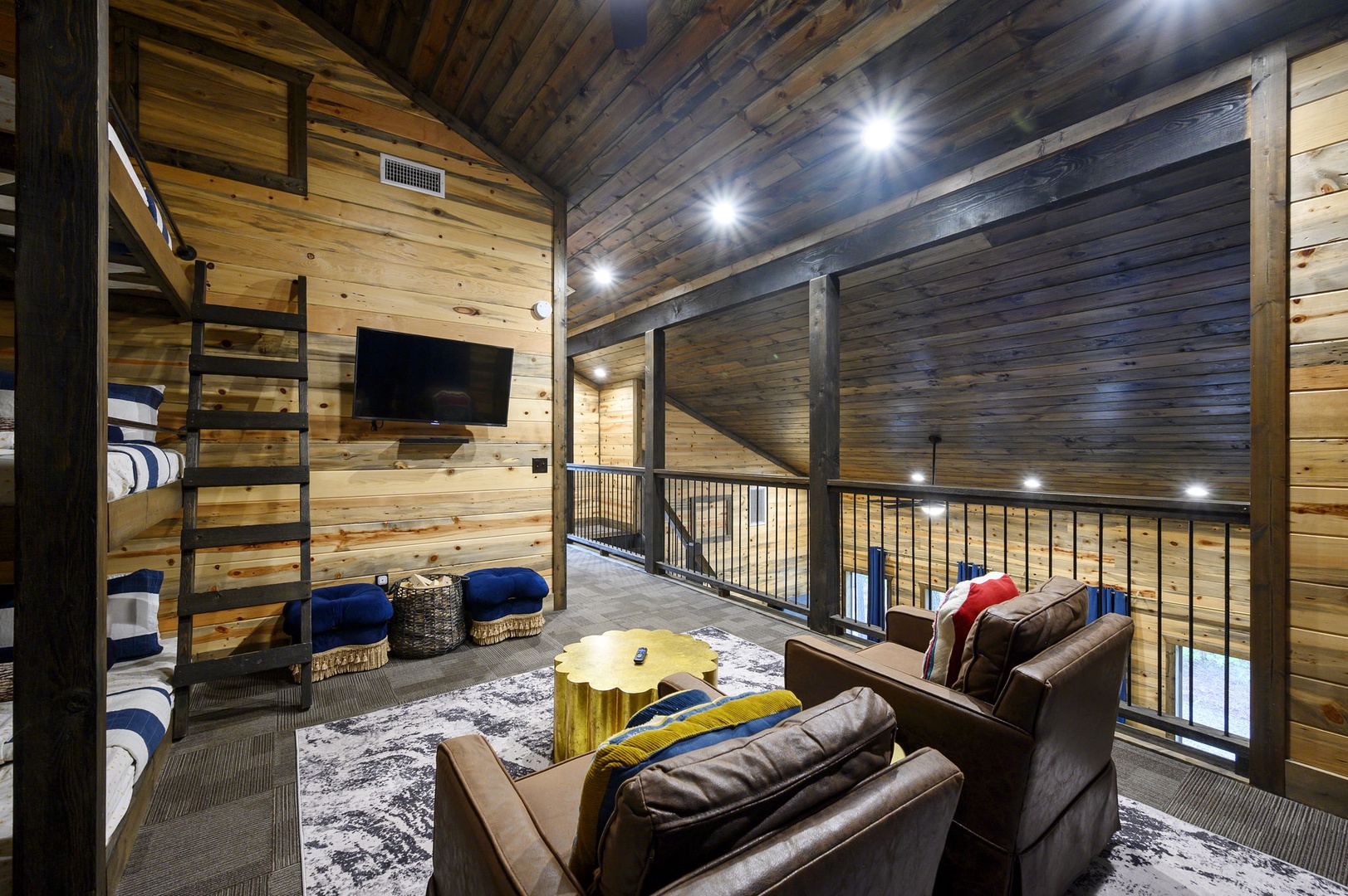 Relax in your unique lofted lounge, where natural wood beams soar overhead and plush leather sofas invite you to unwind. Cozy up with loved ones after a day of adventures.