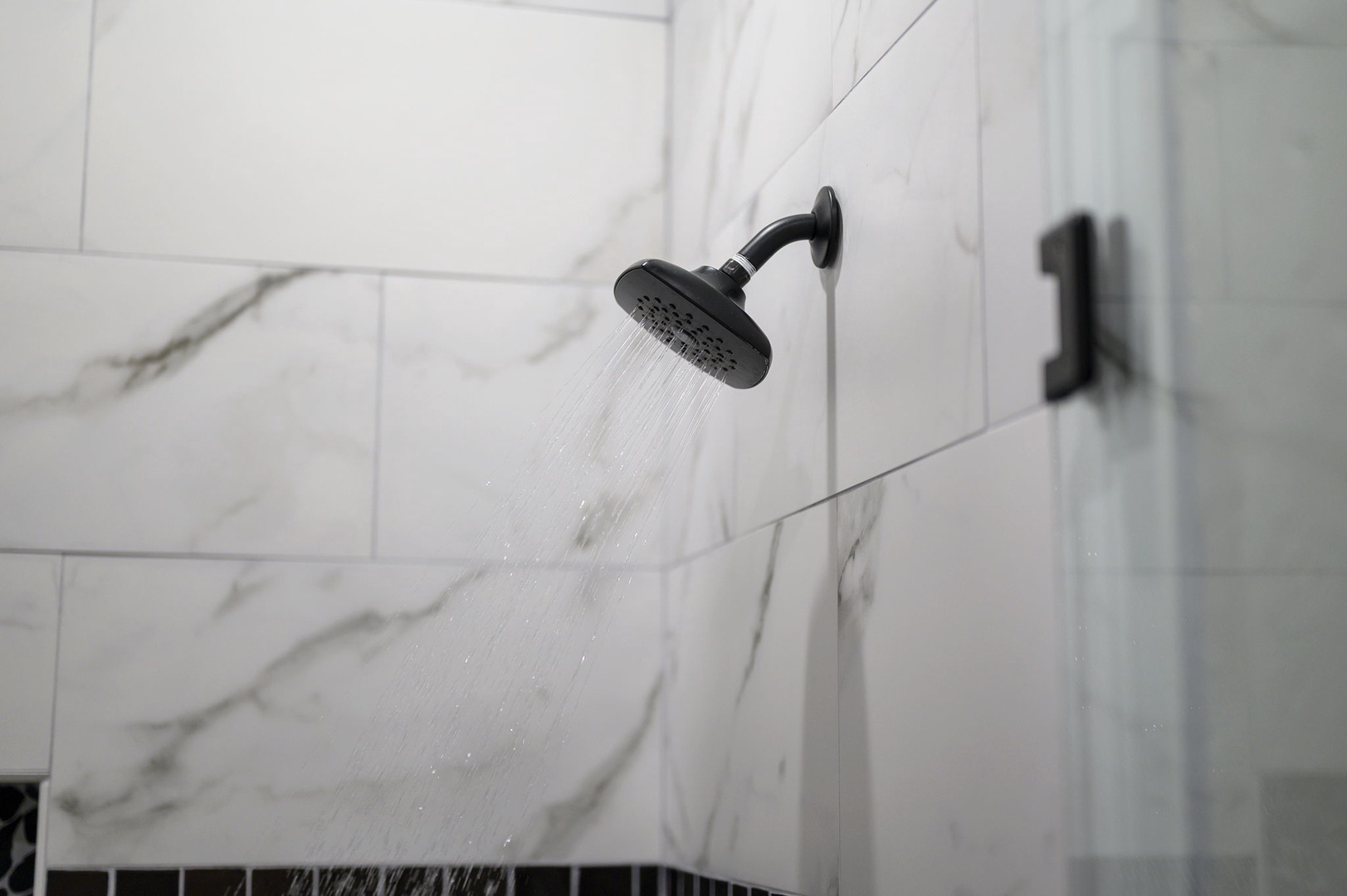 Step into your private spa-like sanctuary with a rainfall shower that promises the perfect reset after a day of adventure or relaxation.