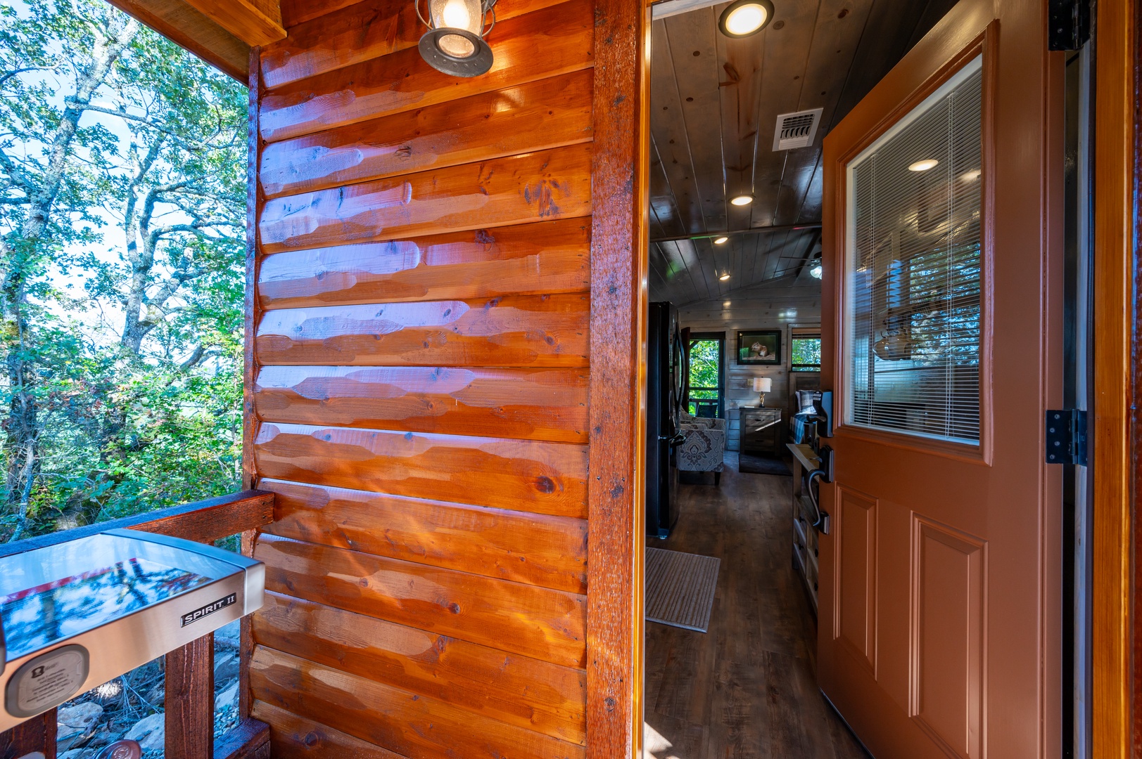 Step into your cozy log cabin retreat where rustic charm meets modern comfort, featuring warm wood beams and stunning forest views.