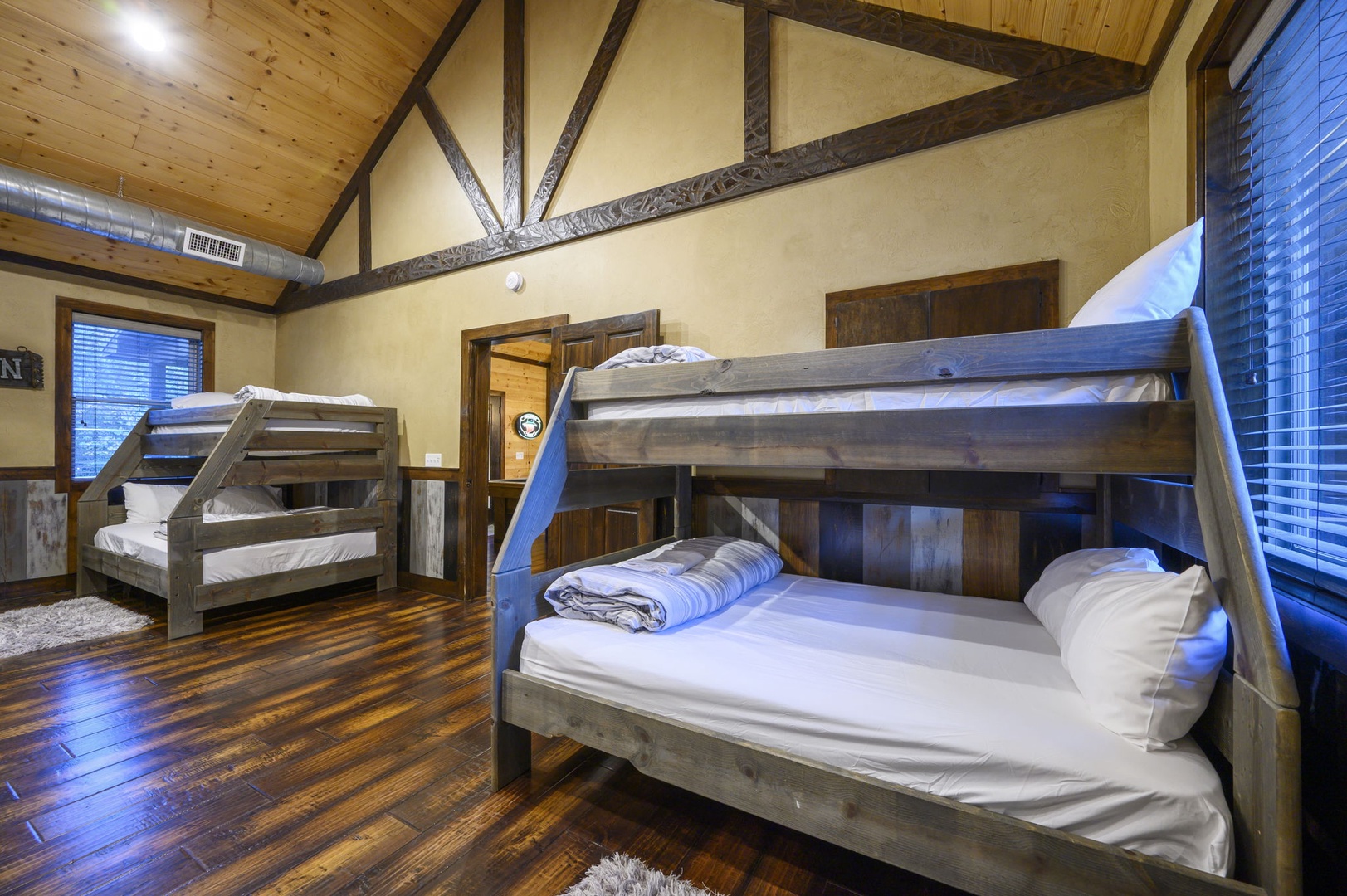 Gather the whole crew under soaring wood ceilings and rustic beams, with two sturdy bunk beds to sleep everyone comfortably. Perfect for families or groups traveling together.