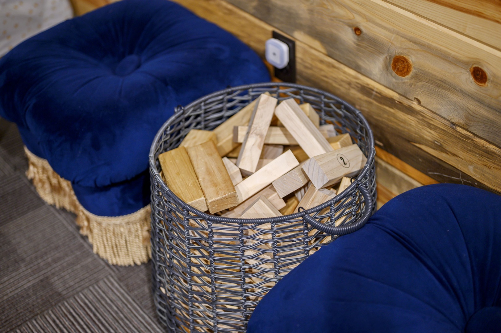 Cozy up by the fire with plush seating and firewood at your fingertips—everything you need for a warm, relaxing evening.
