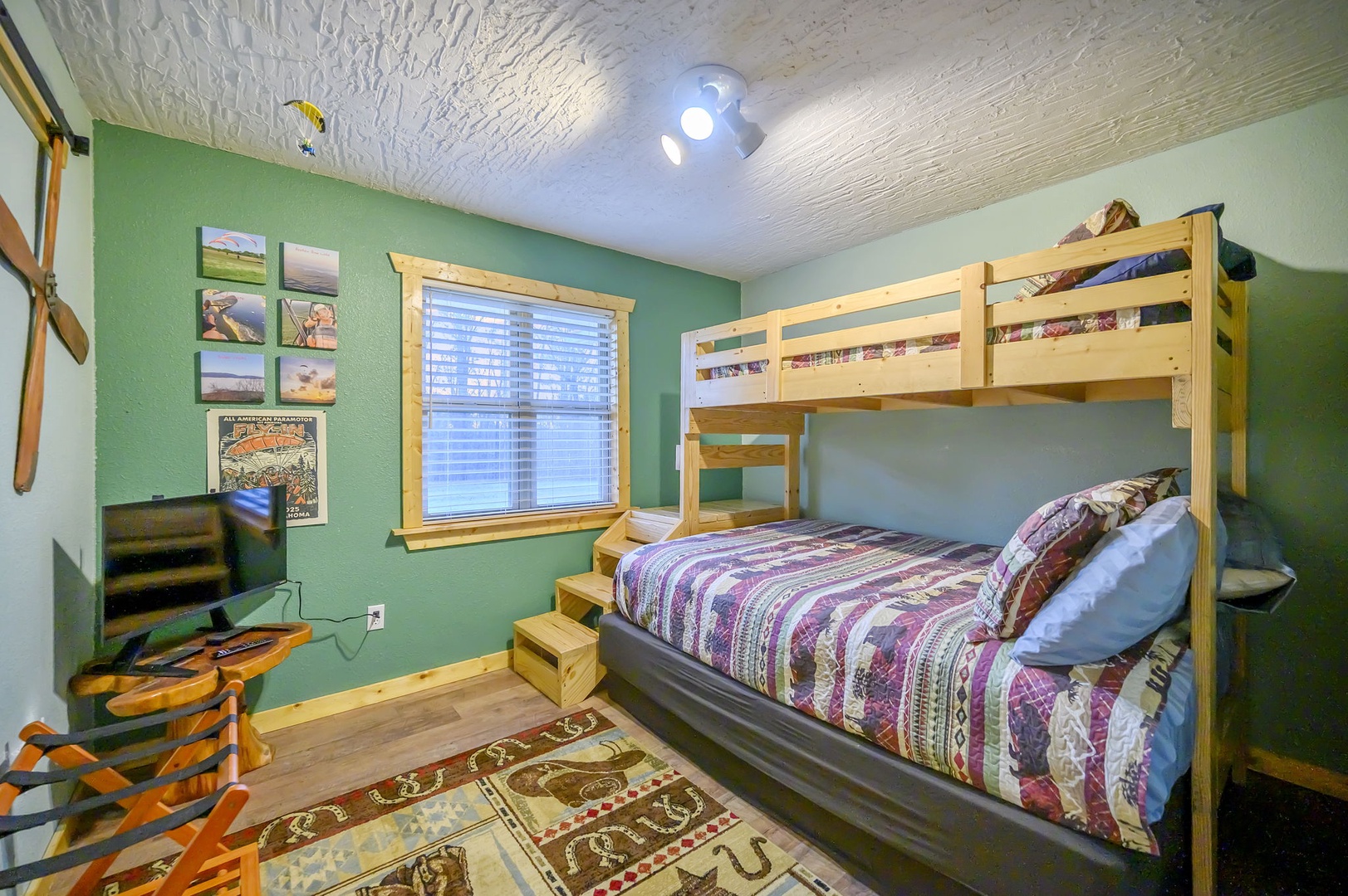 Cozy bunk bed room with rustic charm and playful decor where kids can create lasting vacation memories together.