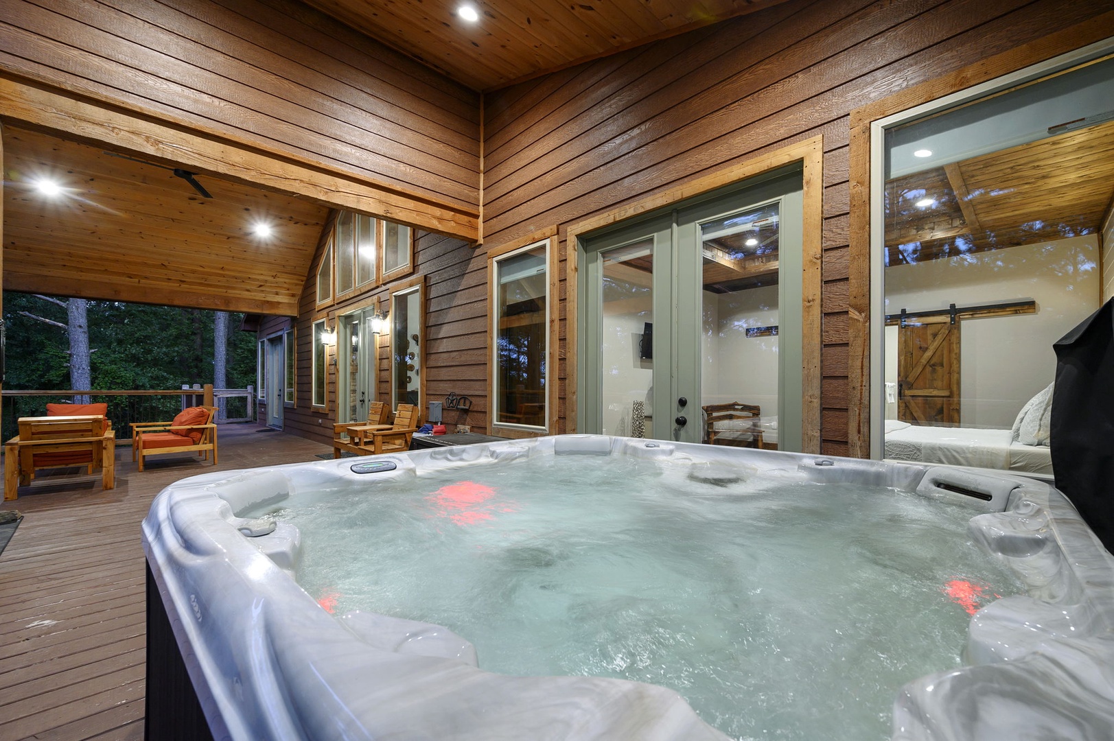 Slip into the warm, bubbling water of your private hot tub and let the day melt away while you relax under the stars and soaking in the peaceful wooded setting.