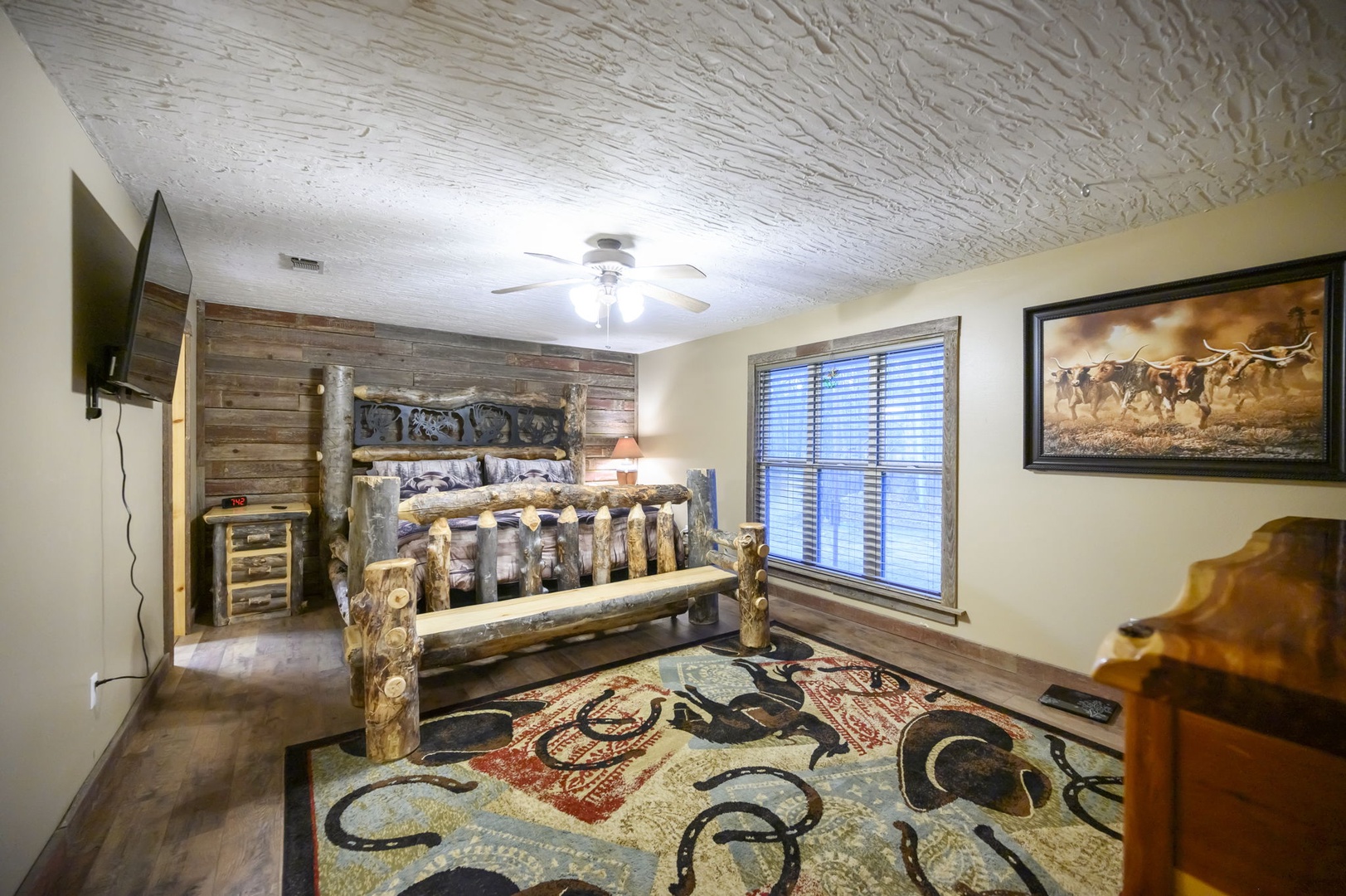 Your rustic retreat features handcrafted log furniture and western charm, creating a cozy sanctuary for peaceful nights.