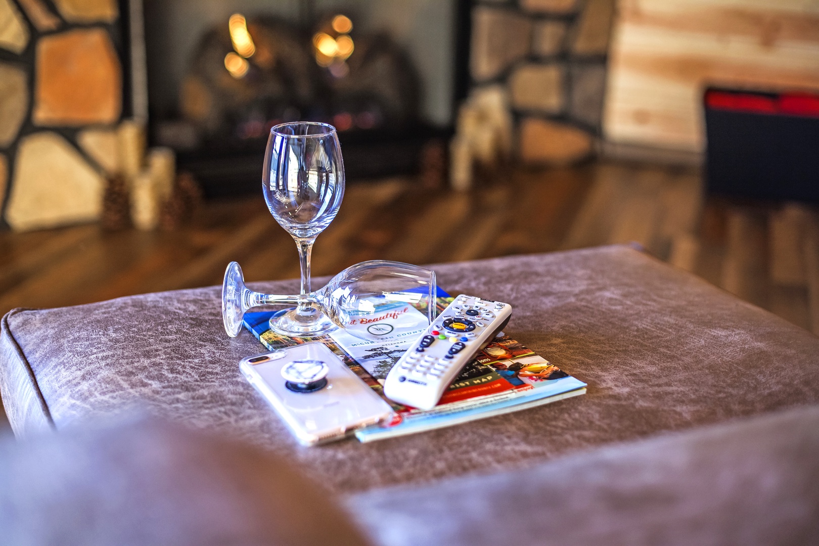 Unwind with wine glasses ready and travel magazines at your fingertips in this cozy, softly-lit space.