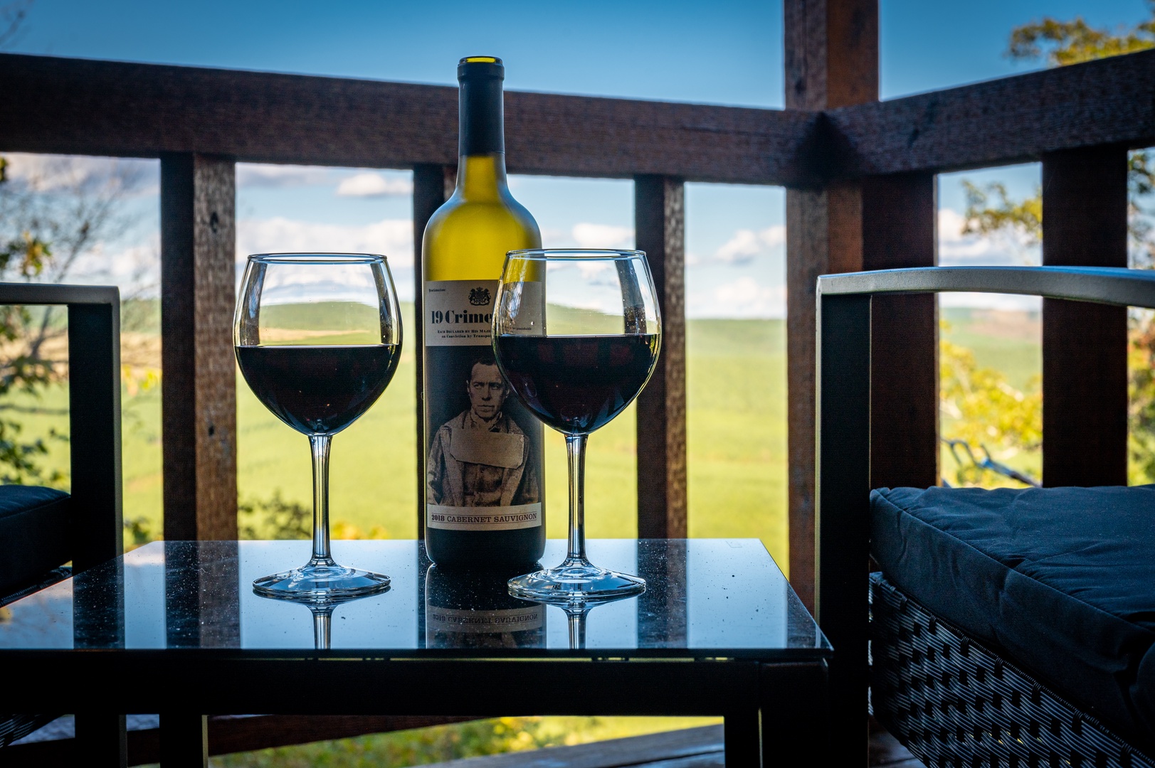 Unwind with a glass of wine on your private balcony, taking in sweeping countryside views that stretch endlessly before you.