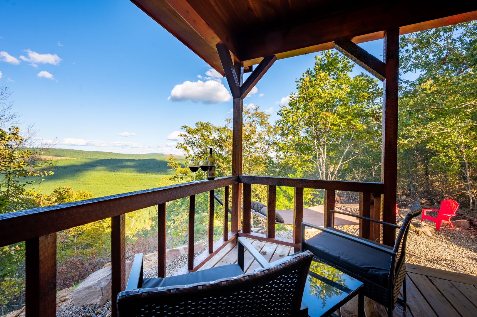 Unwind on your private balcony with sweeping views of rolling hills and lush forests, perfect for morning coffee or evening wine.