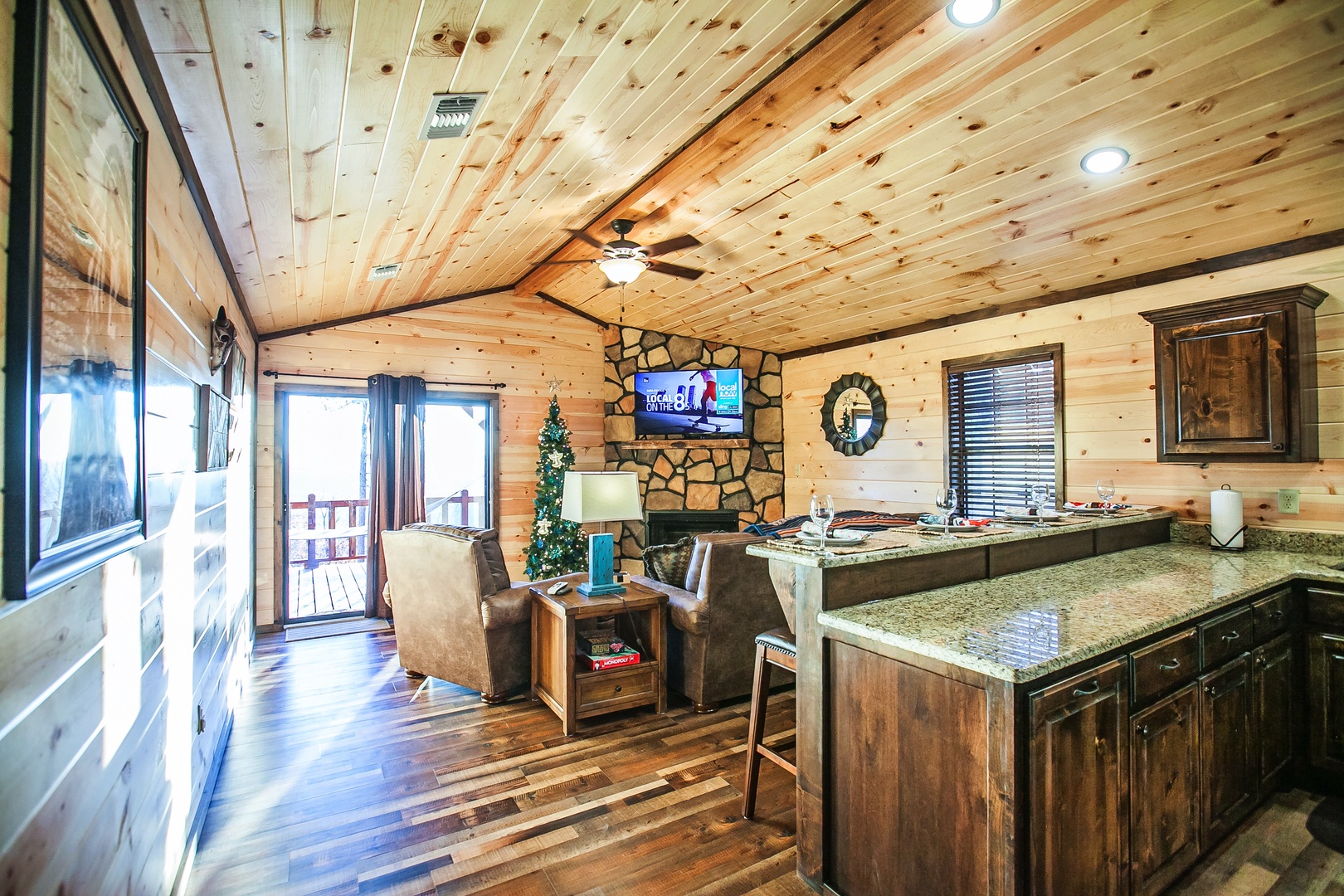 Relax in this rustic cabin with vaulted wood ceilings, cozy fireplace, and granite kitchen—your perfect mountain retreat awaits.