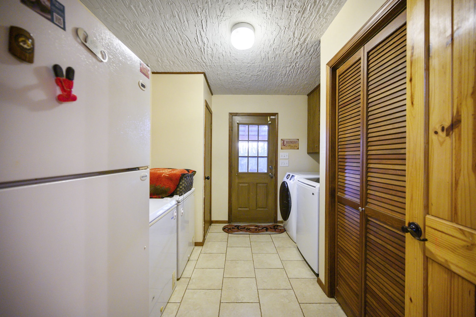 Your dedicated laundry space keeps you prepared with a full-size washer, dryer, and handy storage for all your vacation essentials.