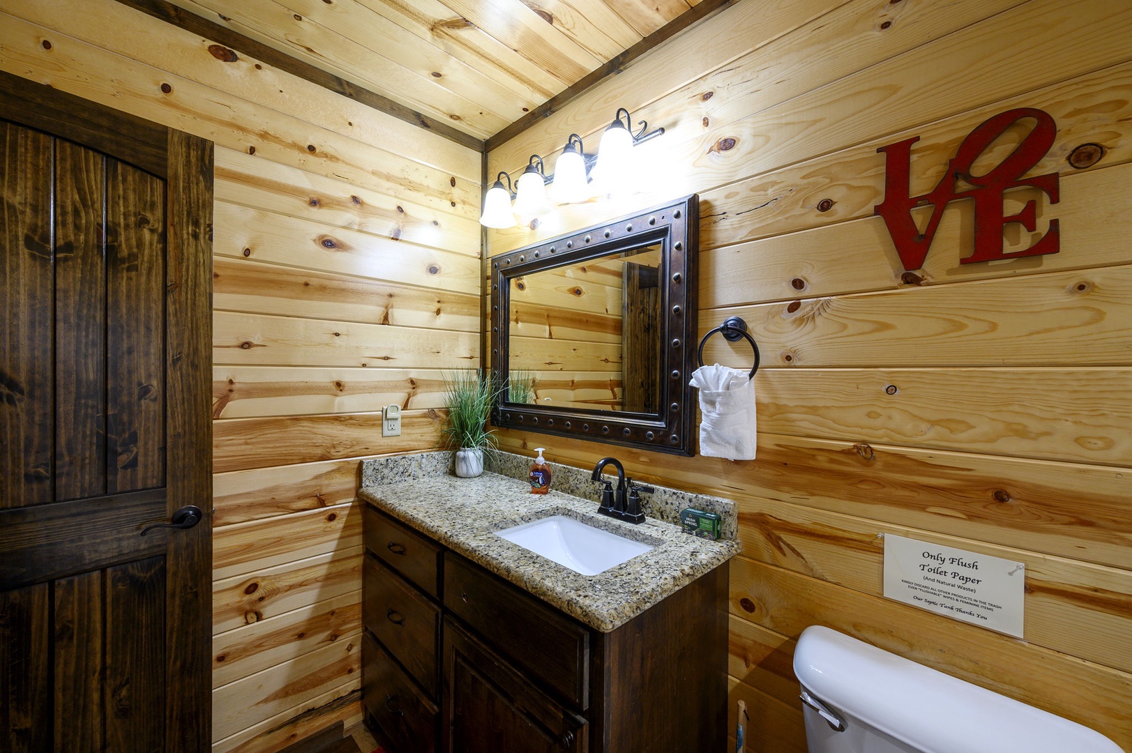 Rustic bathroom with warm wood accents.