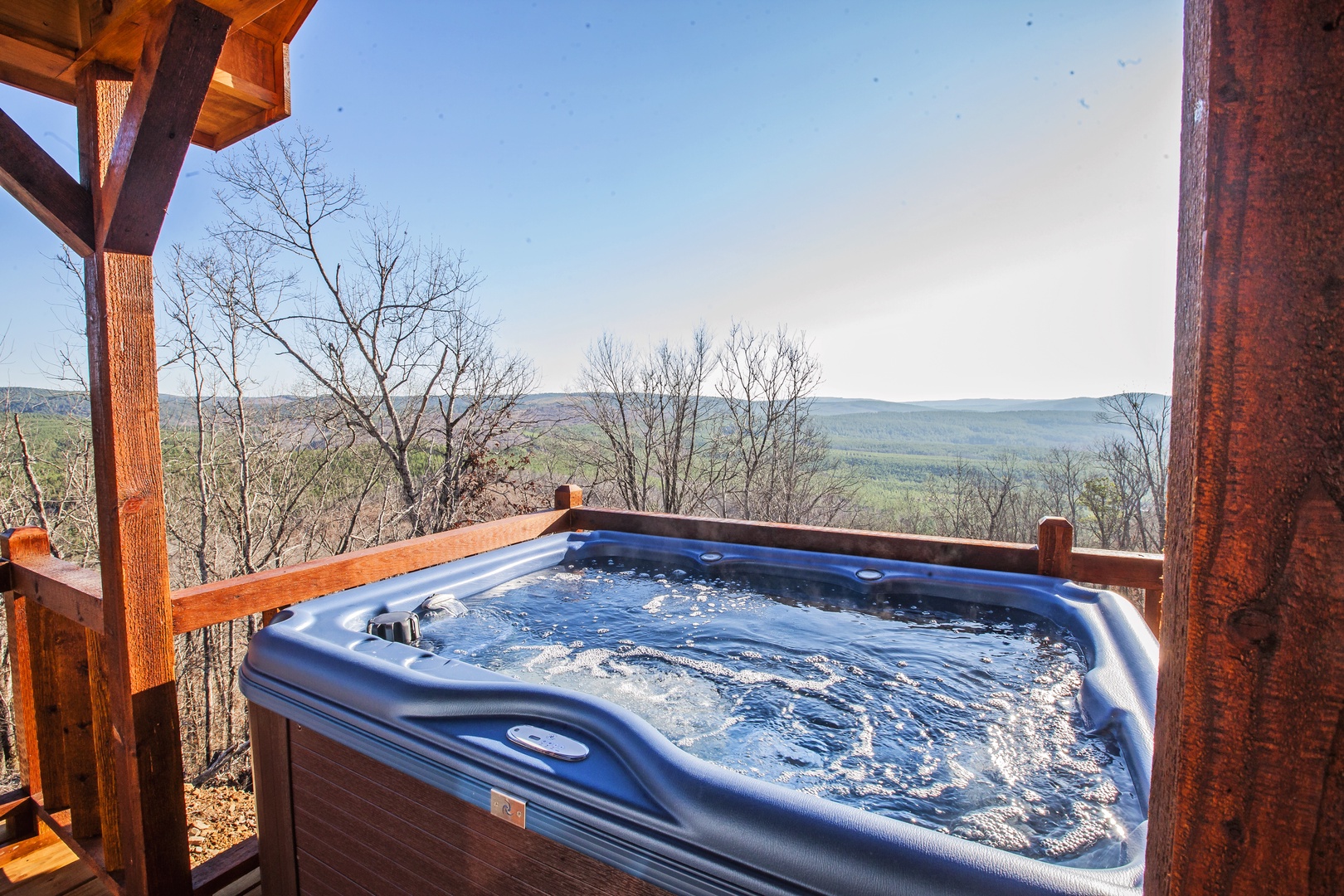 Soak in your private hot tub while gazing at endless mountain vistas stretching to the horizon.