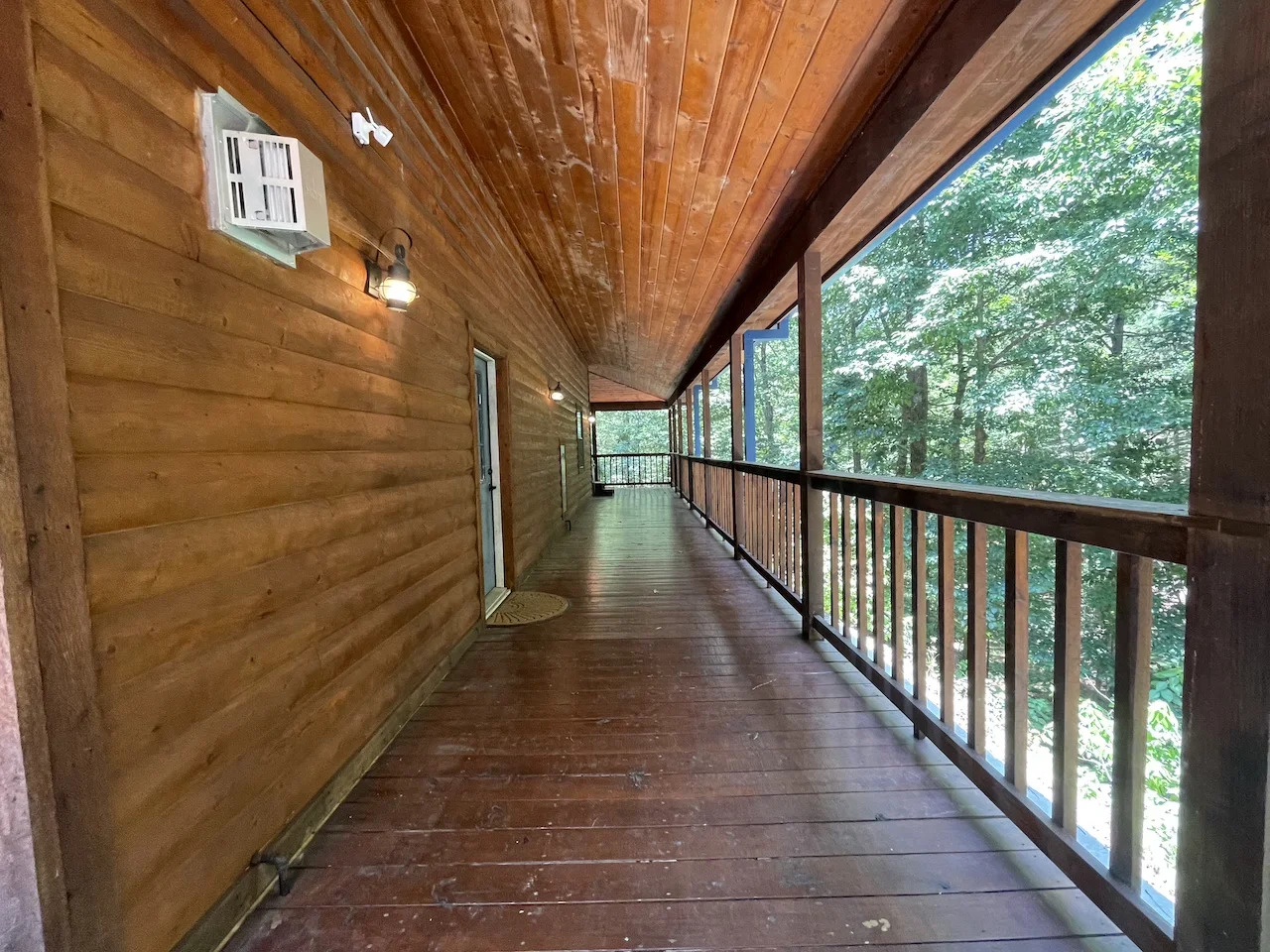 Step out onto your private screened-in porch, where tall trees and fresh mountain air create the perfect backdrop for morning coffee or evening relaxation.