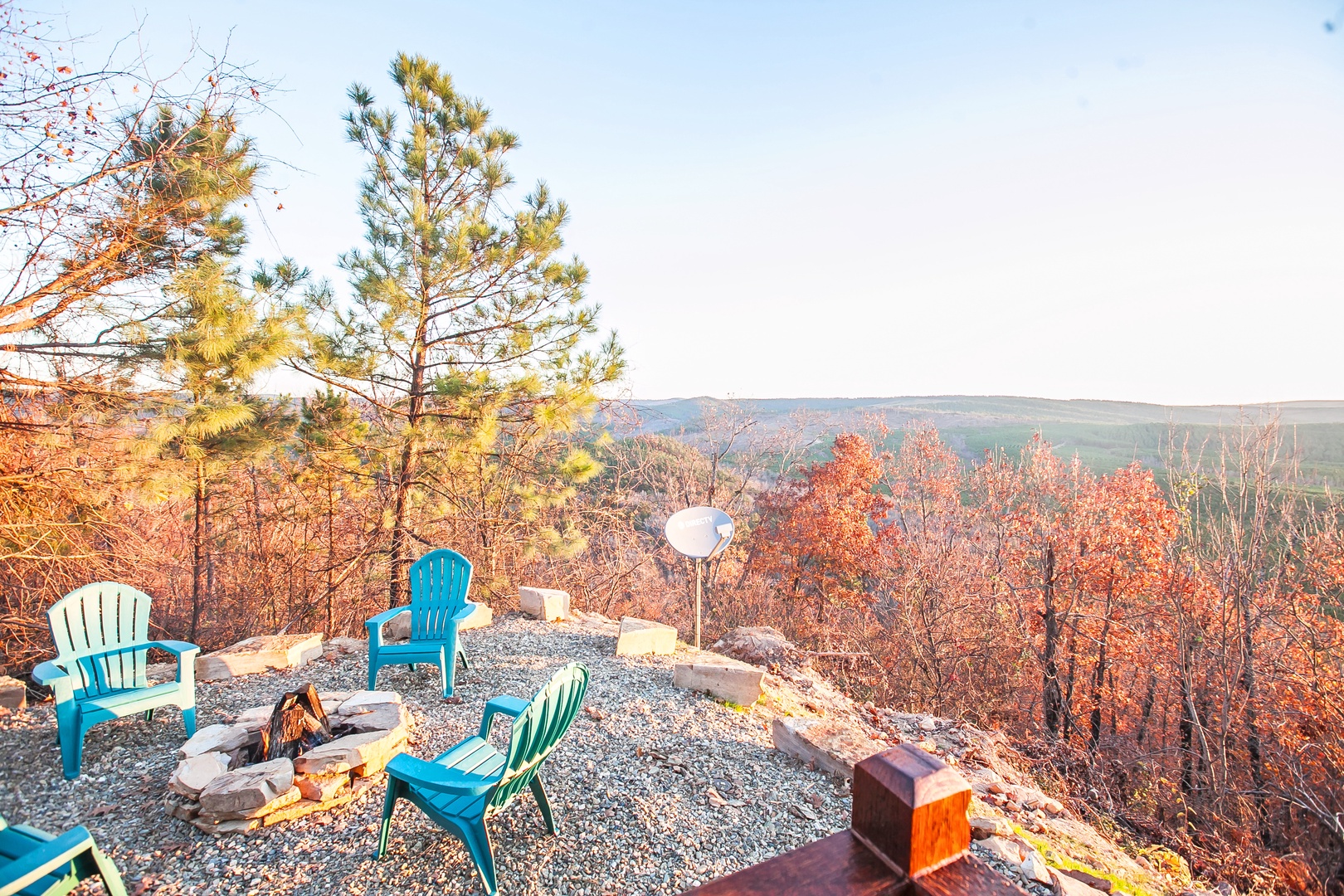Relax in colorful Adirondack chairs around your private fire pit, surrounded by stunning autumn foliage and sweeping valley views.
