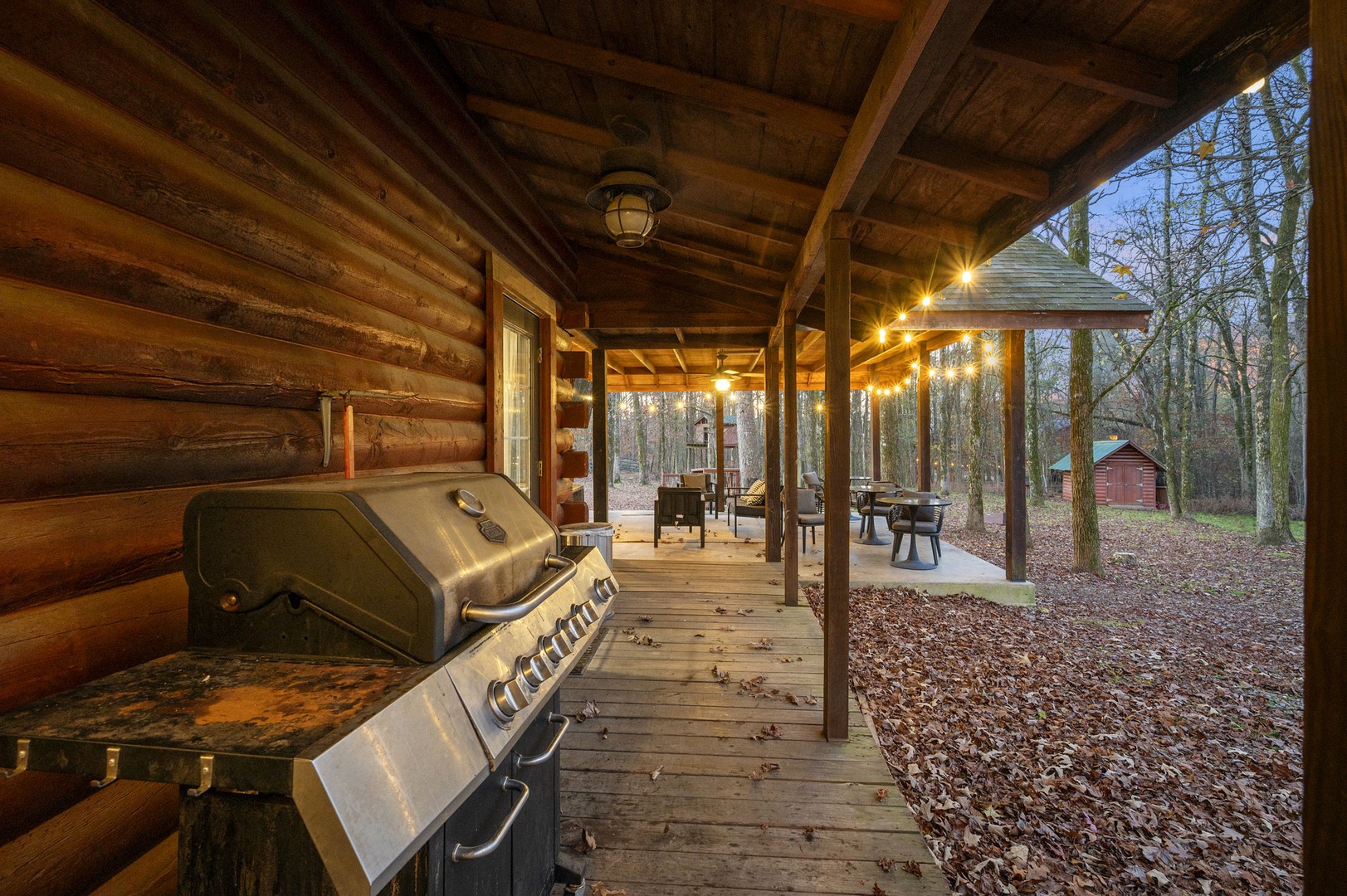 Fire up the grill on your private covered porch, surrounded by peaceful wooded scenery and rustic charm.